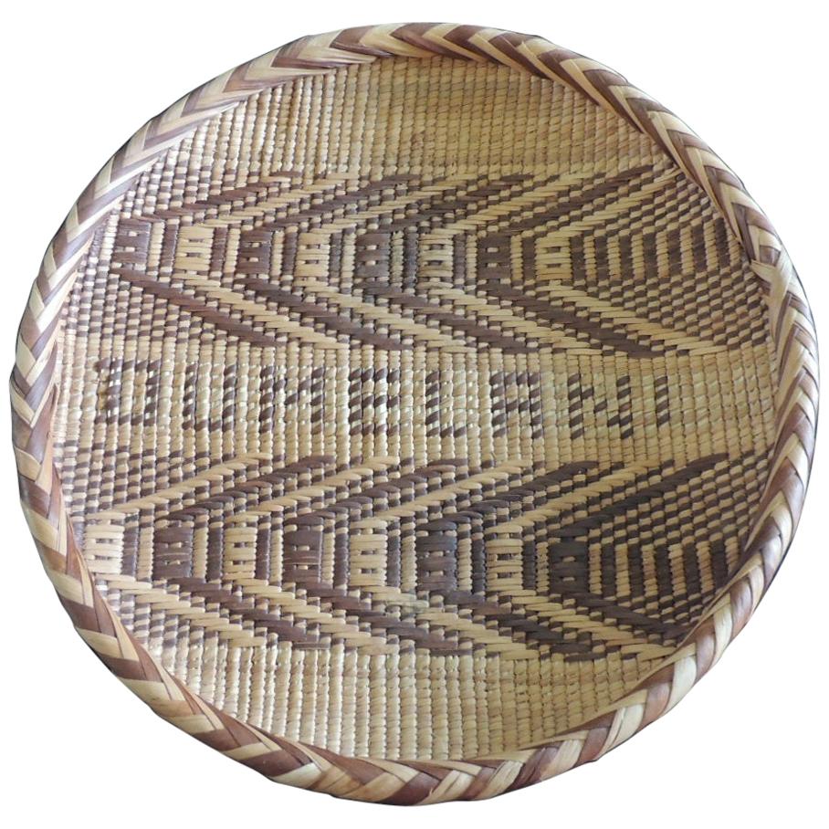 Round Natural and Brown Woven Tribal Basket with Braided Rim