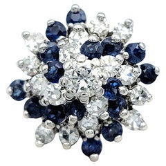 Round Natural Blue Sapphire and Diamond Cluster Ring in 14 Karat White Gold