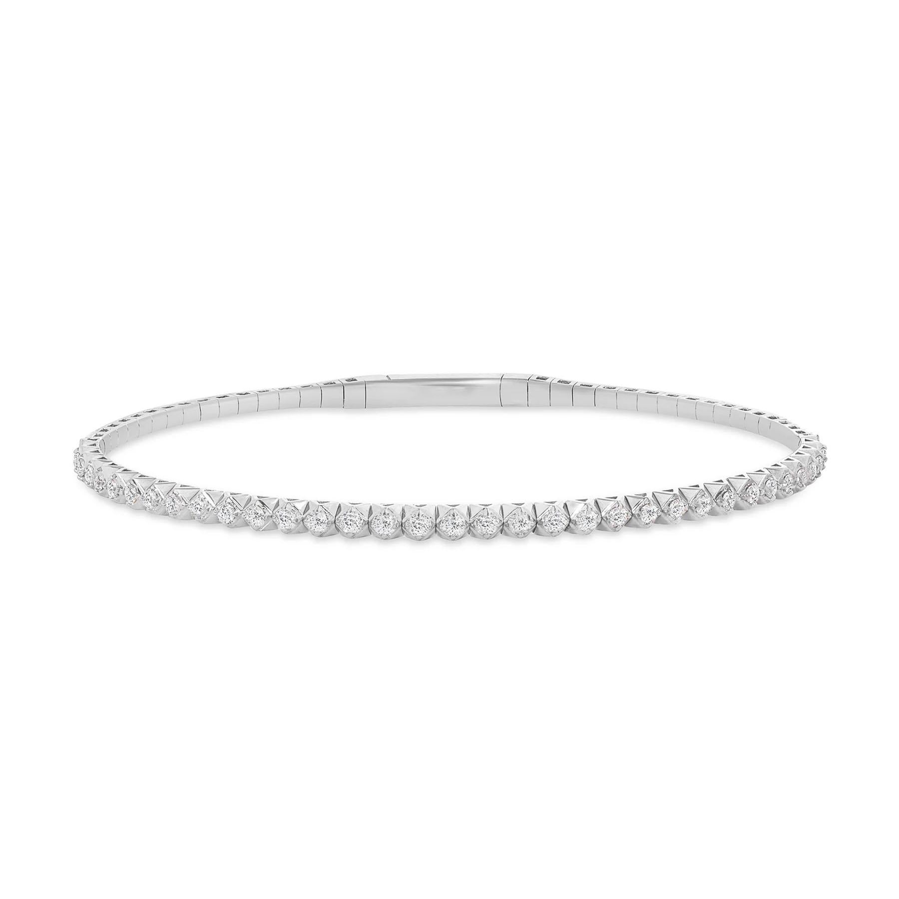 Elevate your elegance with the stunning 14k Gold Round Natural Diamond Bangle, a timeless piece designed to add sparkle to any occasion. Crafted with 1 carat of shimmering round natural diamonds and available in white, yellow, or rose gold, this