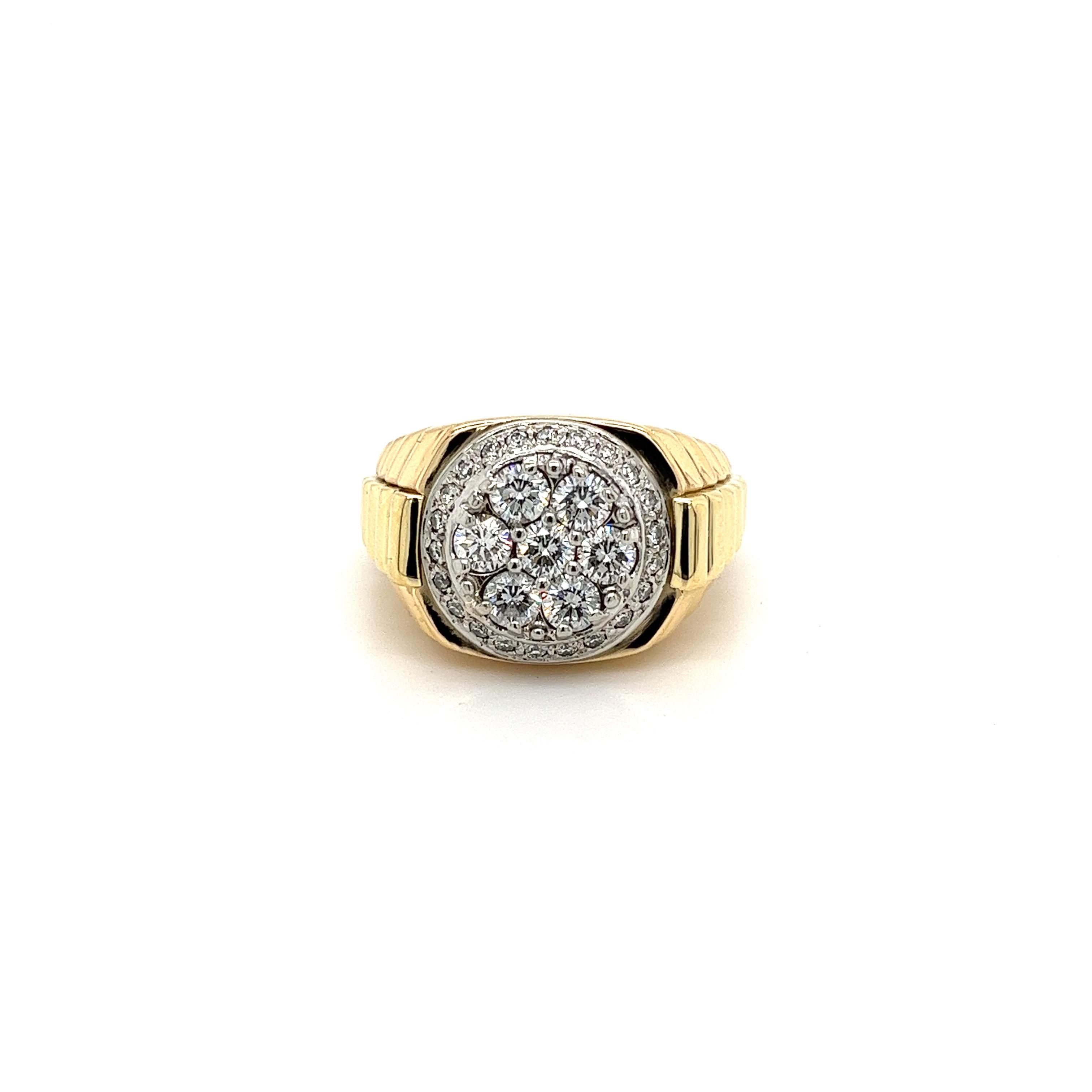 Vintage natural diamond men's ring set in 18k solid gold. Diamonds are all exceptional VS1-VS2 quality stones with equally pristine baguette-cut diamond side stones on the ring shank. Diamonds mounted in a classic vintage 18k gold 