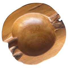 Ciotola rotonda in teak naturale a forma libera