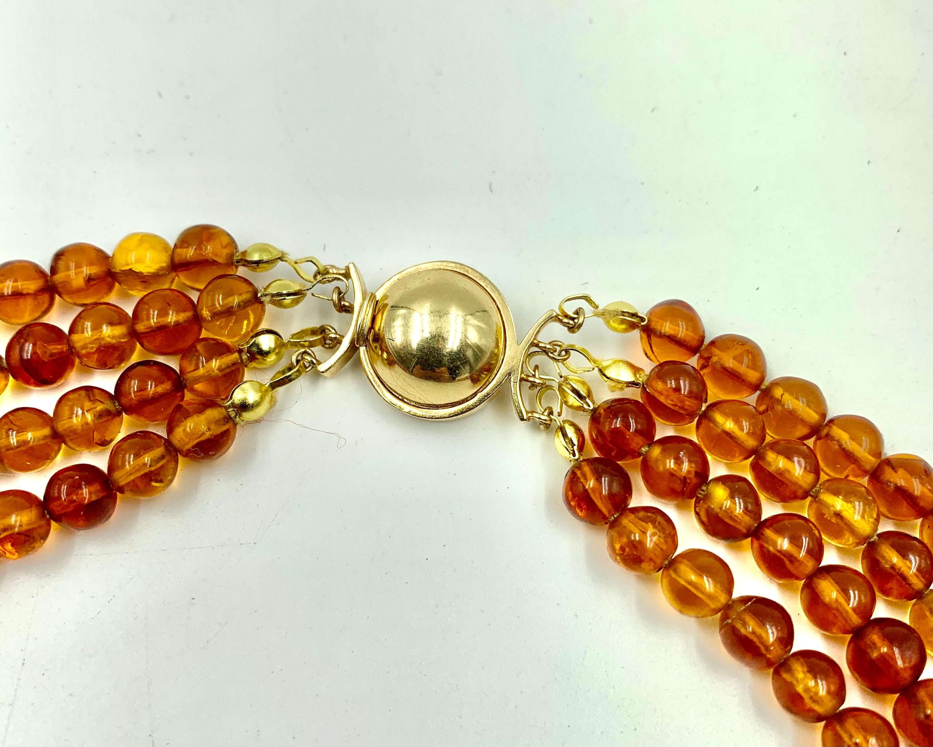 Round Natural Honey Amber 14K Hammered Gold Bead Multi-Strand Necklace In Good Condition For Sale In New York, NY