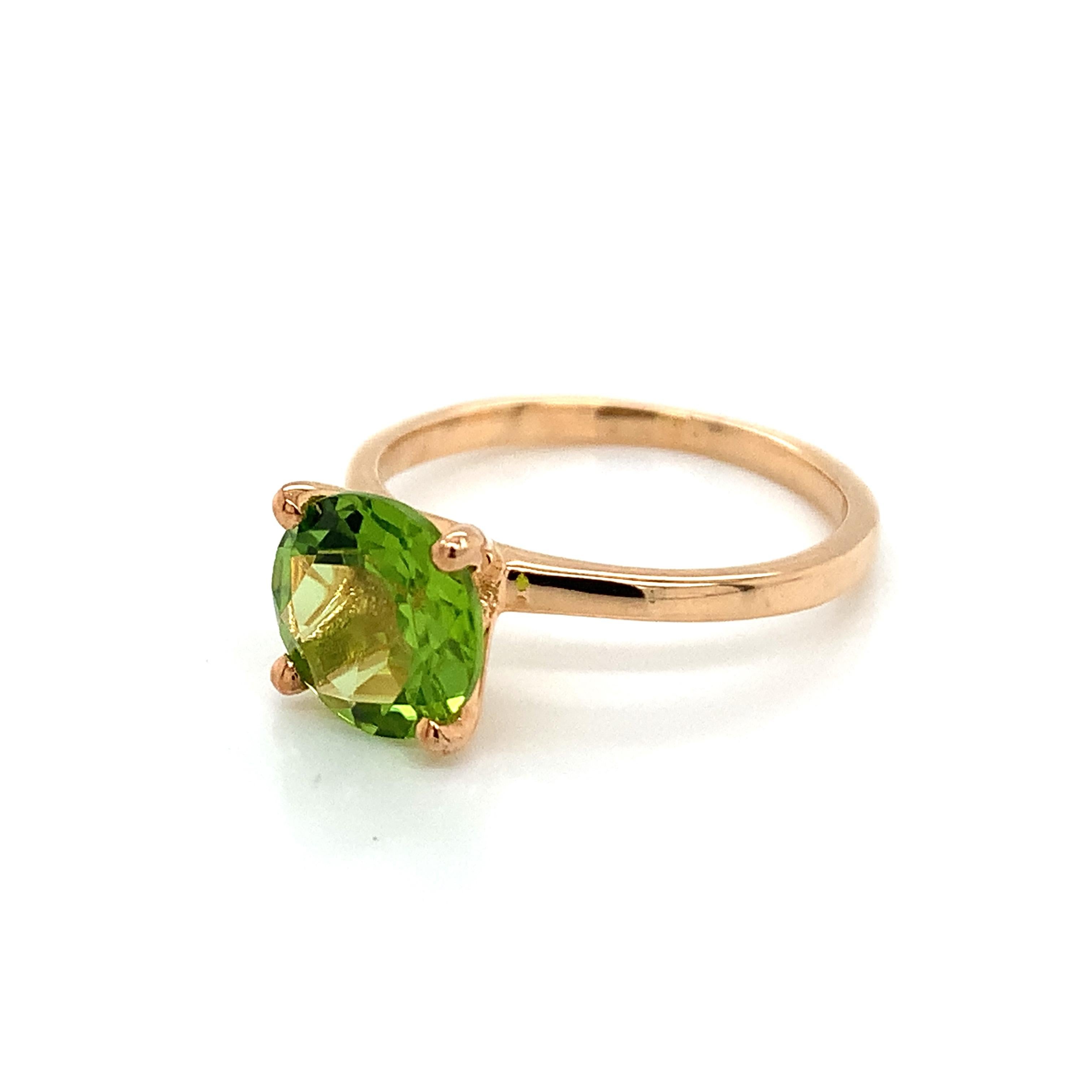 Round Shape Peridot Gemstone beautifully crafted in a Ring. A fiery Green Color August Birthstone. For a special occasion like Engagement or Proposal or may be as a gift for a special person.

Primary Stone Size - 8x8mm
