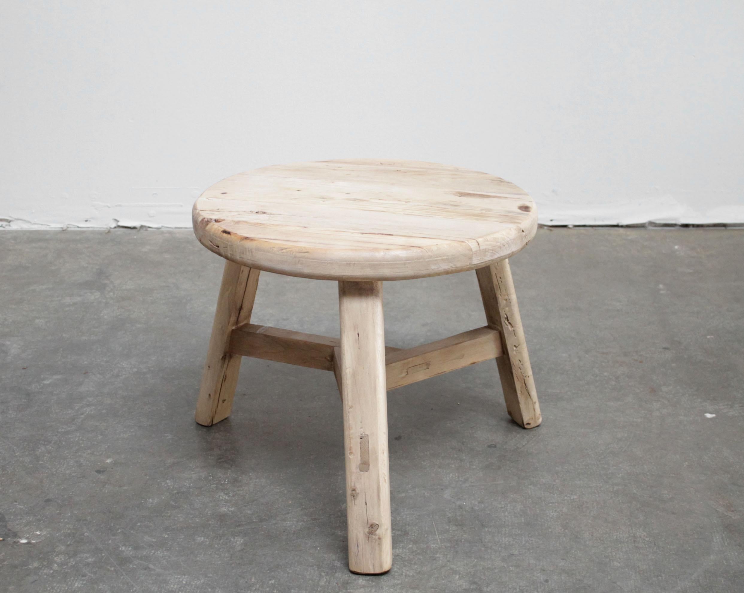 Round natural side table made from reclaimed elmwood.
Raw natural finish, a warm honey with gray tones in the wood. Solid and sturdy, a great side table for next to a bed, sofa, chairs.
Size: 21