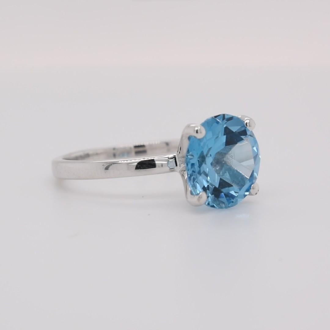 Round Cut Round Natural Swiss Blue Topaz Rhodium Over Sterling Silver Ring For Sale
