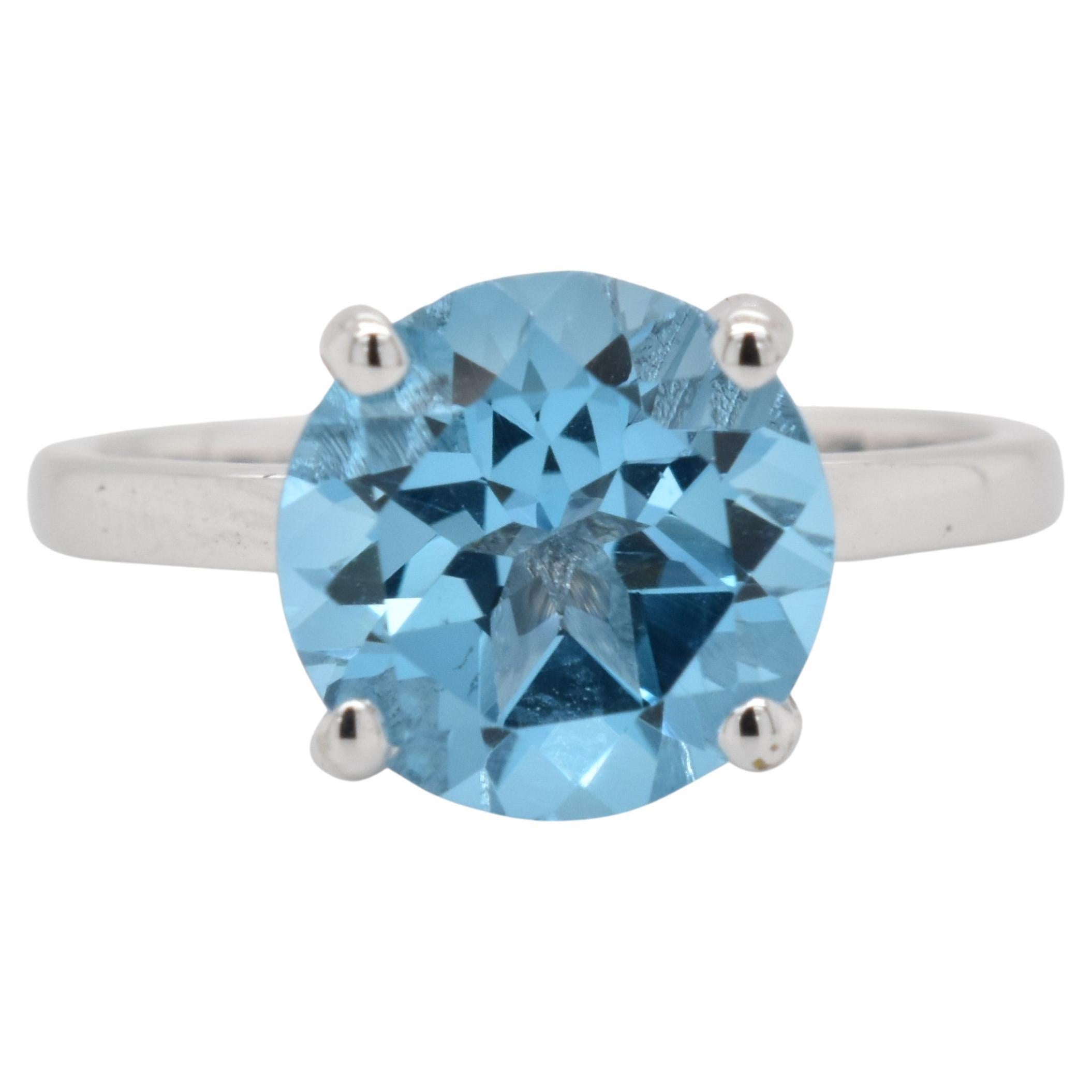 Round Natural Swiss Blue Topaz Rhodium Over Sterling Silver Ring For Sale