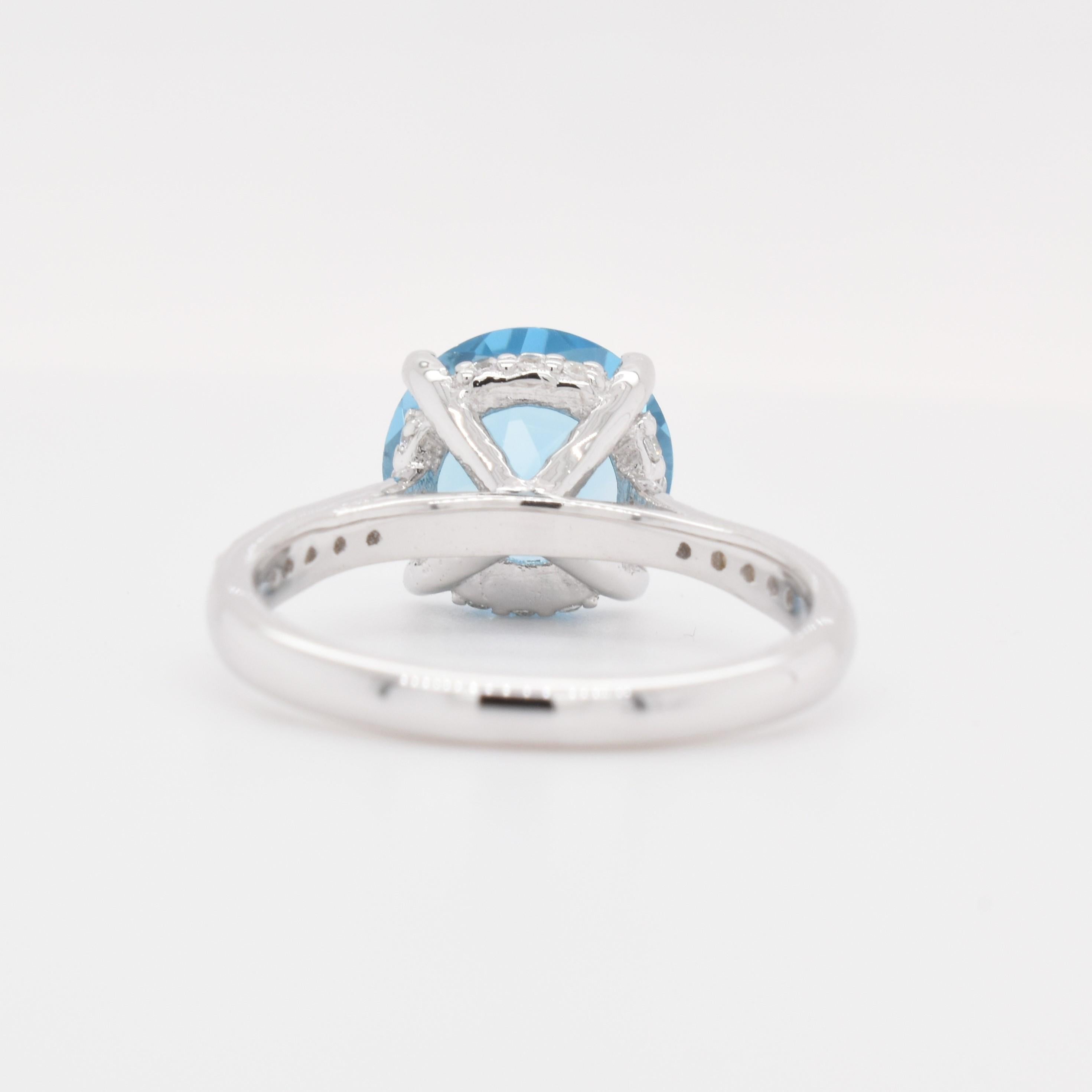 Round Cut Round Natural Swiss Blue Topaz And CZ Rhodium over Sterling Silver Ring For Sale