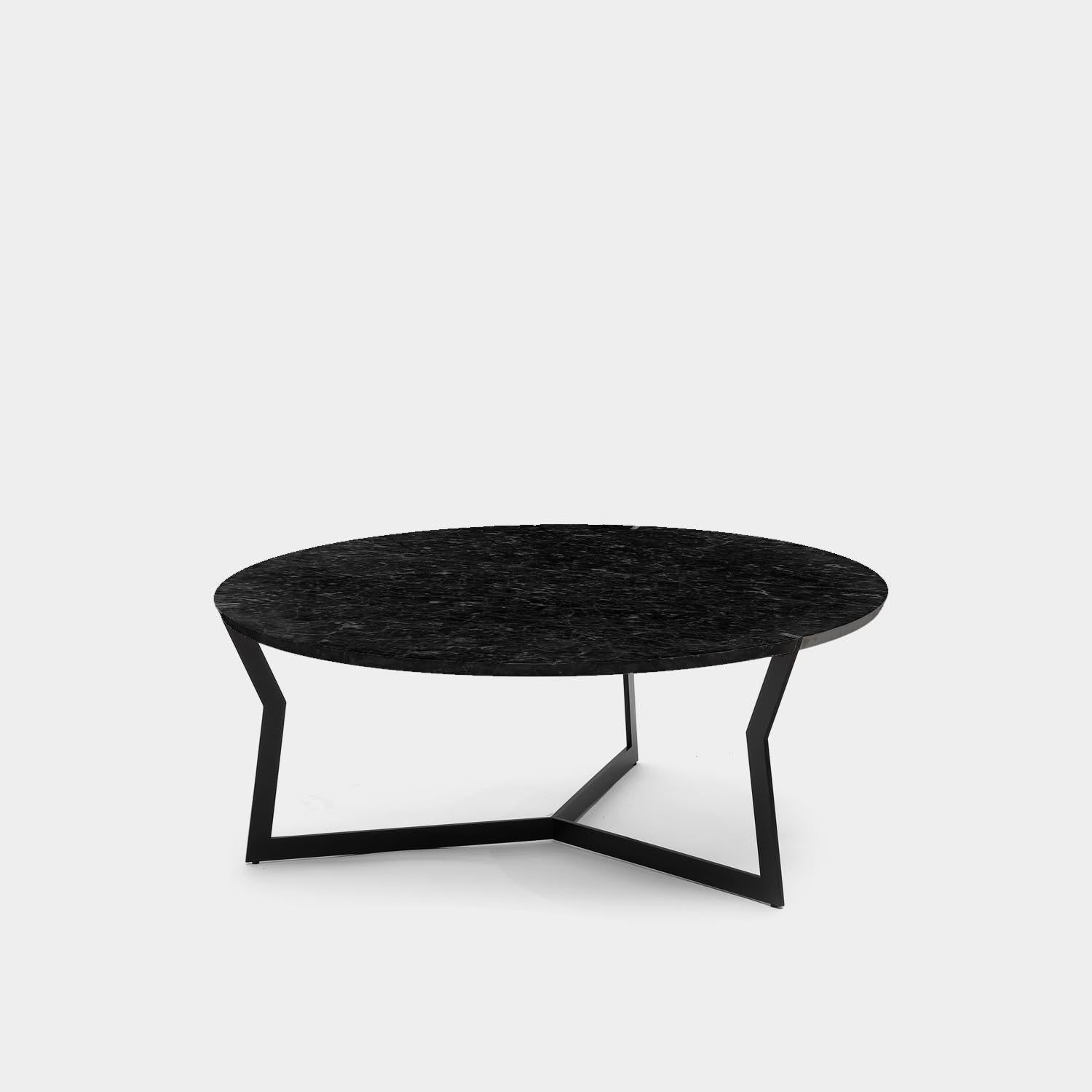 Round Nero Marquina star coffee table by Olivier Gagnère
Materials: Carrara marble or black Marquina marble top. Gold lacquered metal base.
Technique: Lacquered metal, polished marble. 
Dimensions: Diameter 90 x Height 35 cm
Also available in