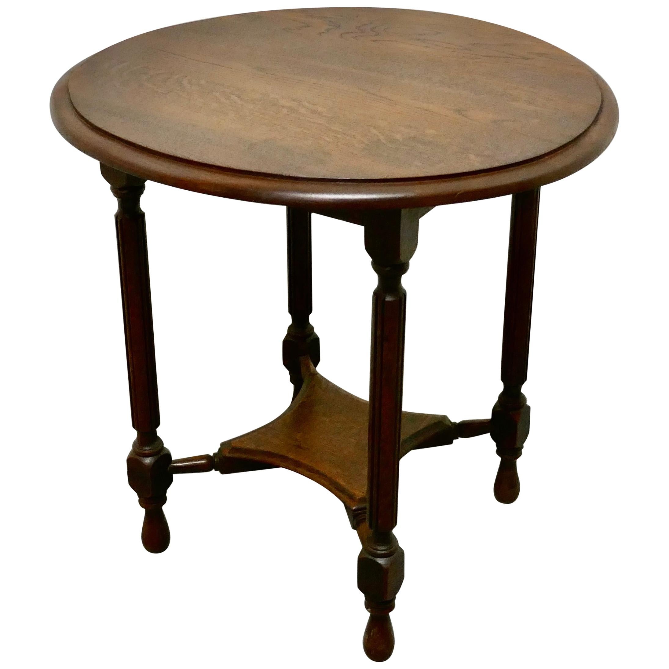 Round Oak Occasional Table, with Undertier For Sale