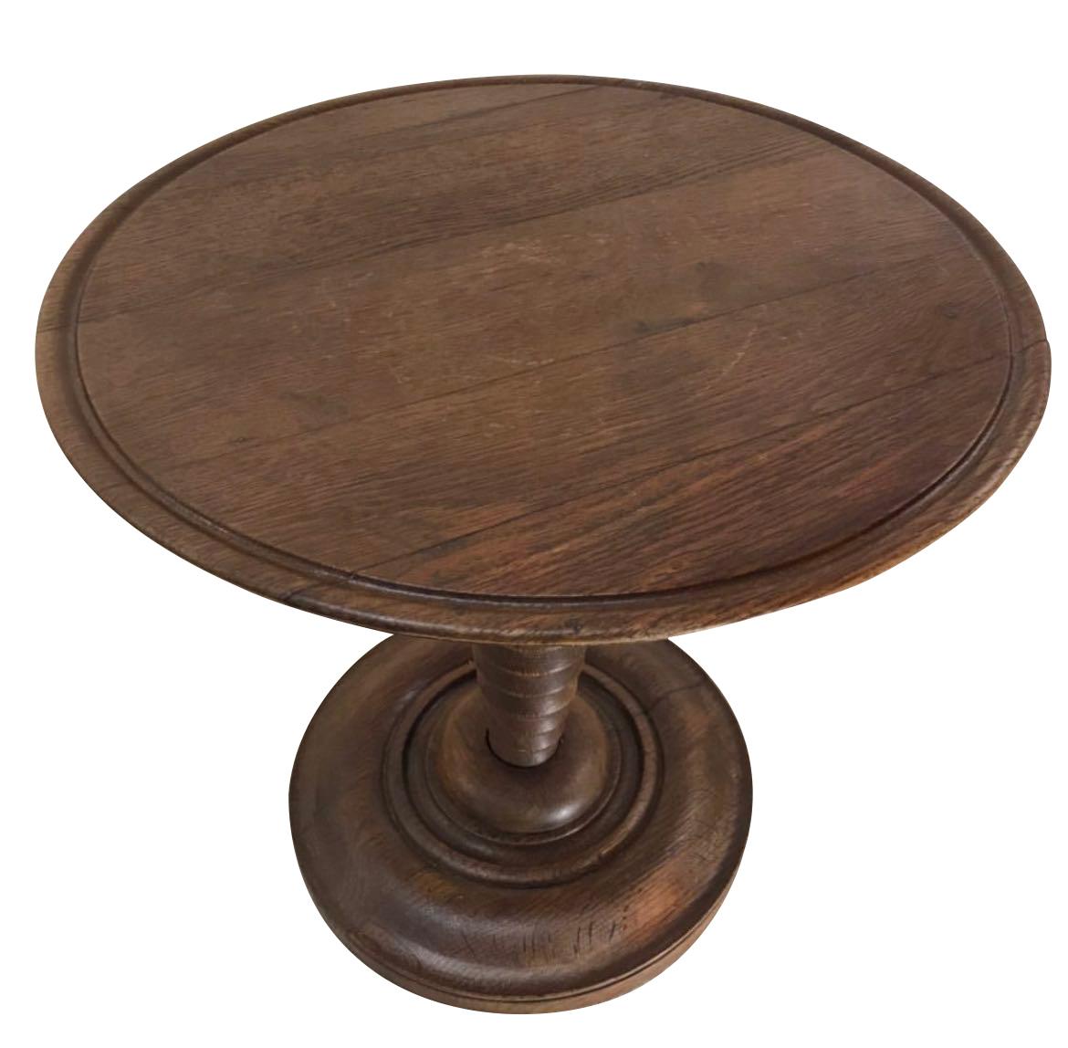 Mid Century French round oak side table with decorative tiered column base.
In the style of Charles Dudouyt.
