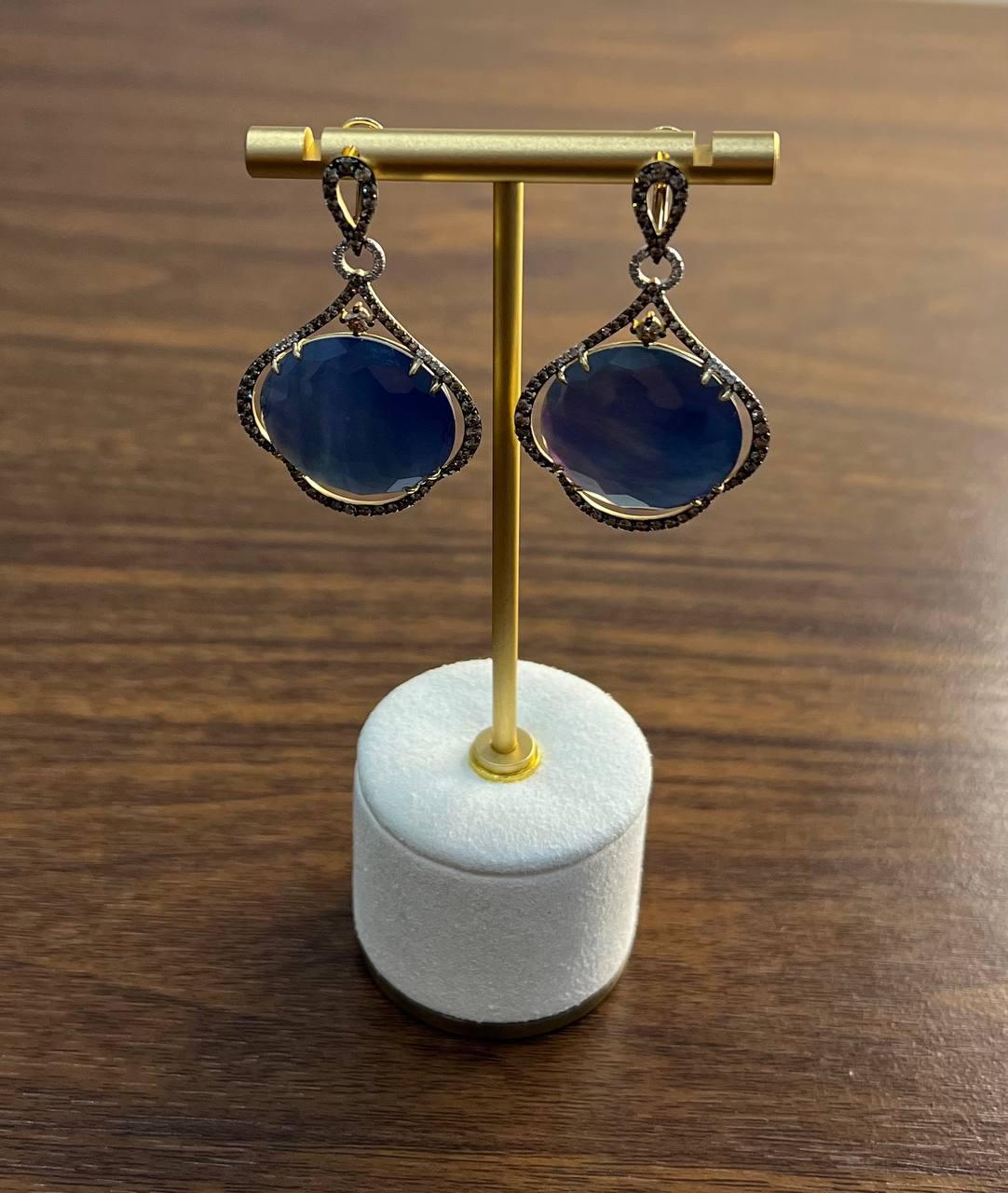 Elevate your style with these stunning earrings crafted in 14k gold, featuring 44.46 carats of captivating gemstones.

The rich, deep hues of the stones create a mesmerizing allure, ideal for any elegant event or sophisticated evening.

Intricate,