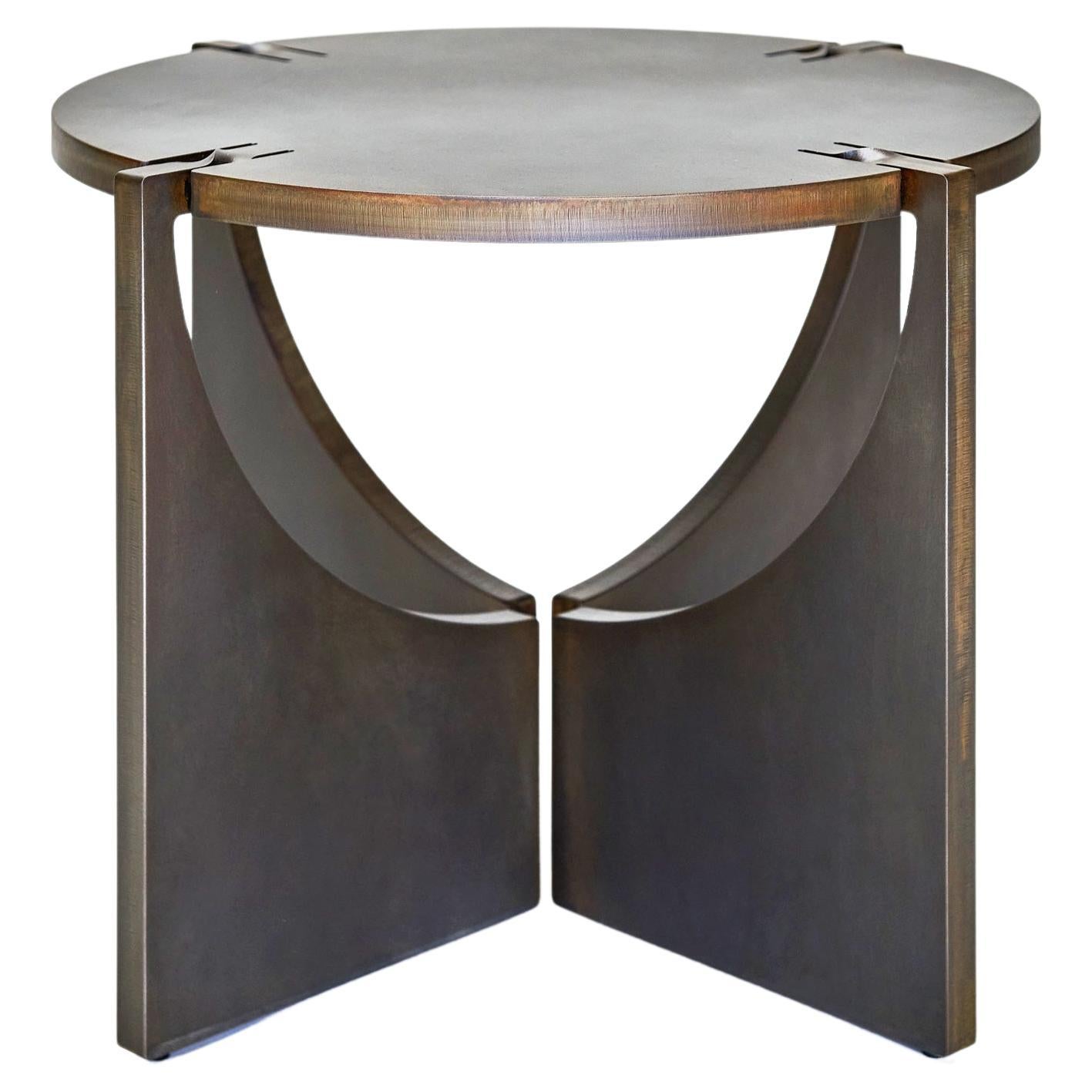 Folded steel side table with dark bronze patina 'Round One' – by Frank Penders