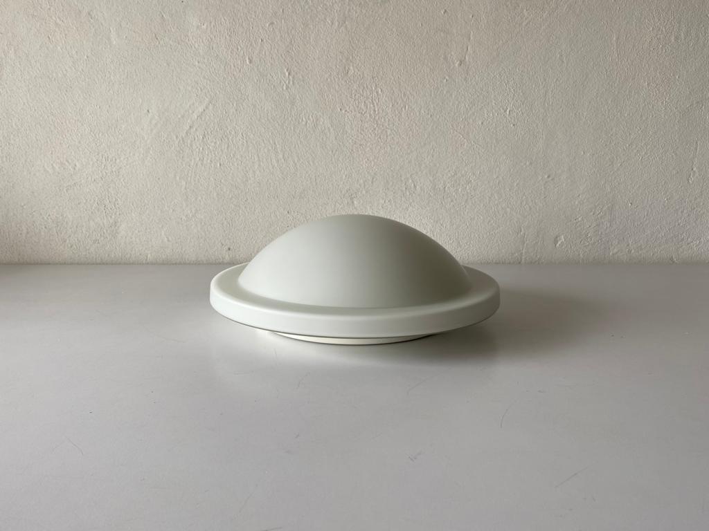 Round opal glass wall or ceiling lamp by Peill Putzler, 1970s, Germany.

It is very ideal and suitable for all living areas.


Lamp is in good condition. No damage, no crack.
Wear consistent with age and use.

This lamp works with E27 light