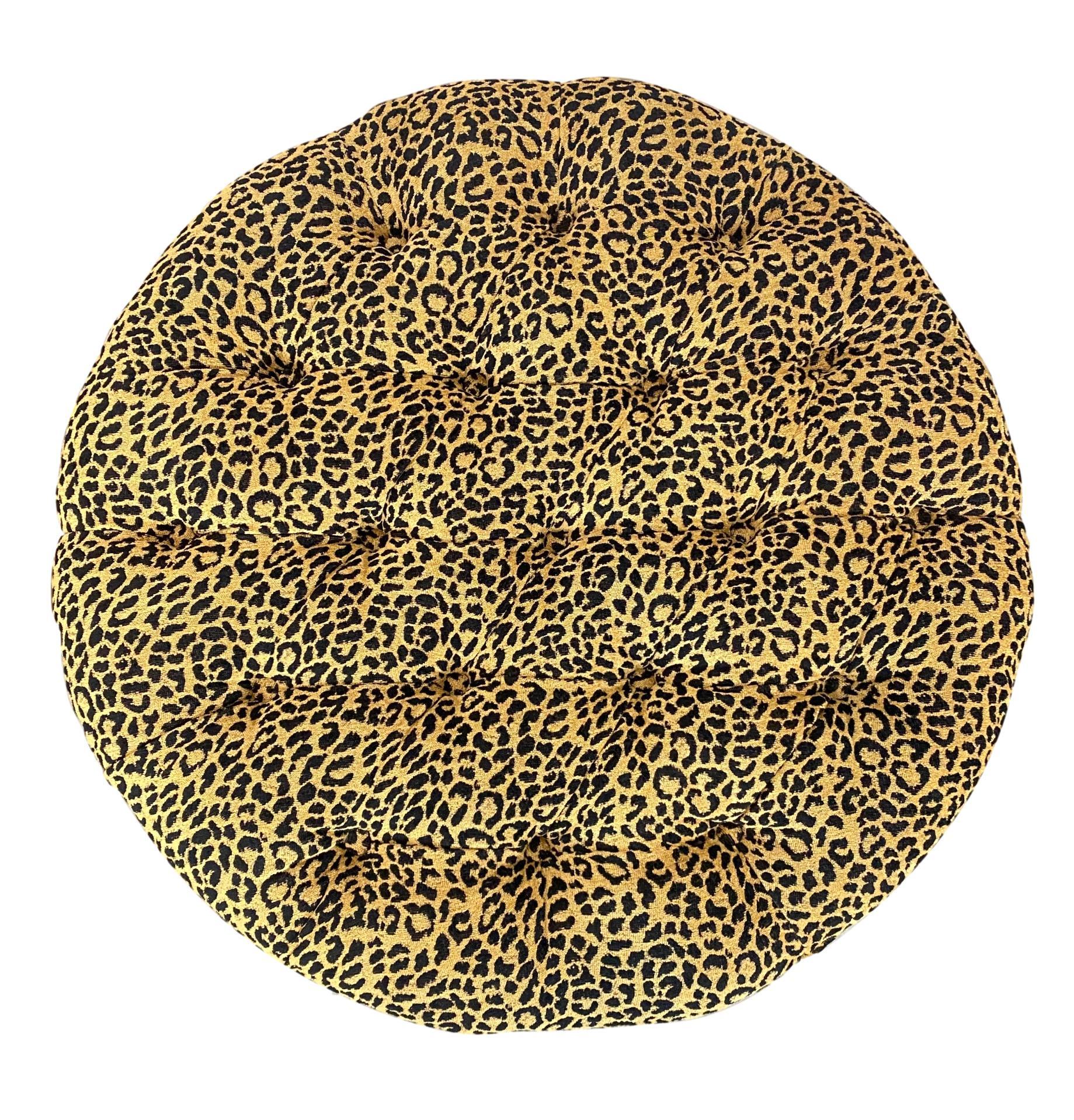 Round ottoman 33-in diameter, newly upholstered in designer leopard print chenille, button-tufted on castors.