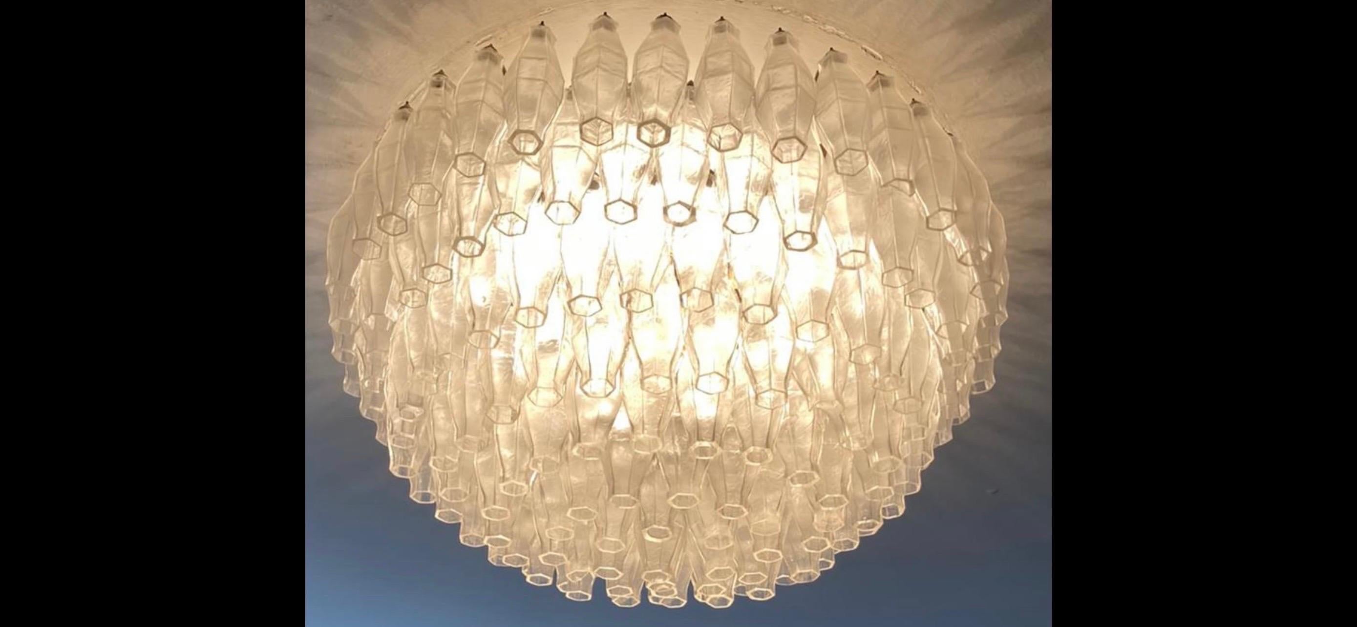 Elegance and simplicity for this extraordinary pair of venini Murano glass chandeliers with transparent, unique and inimitable polyhedra.