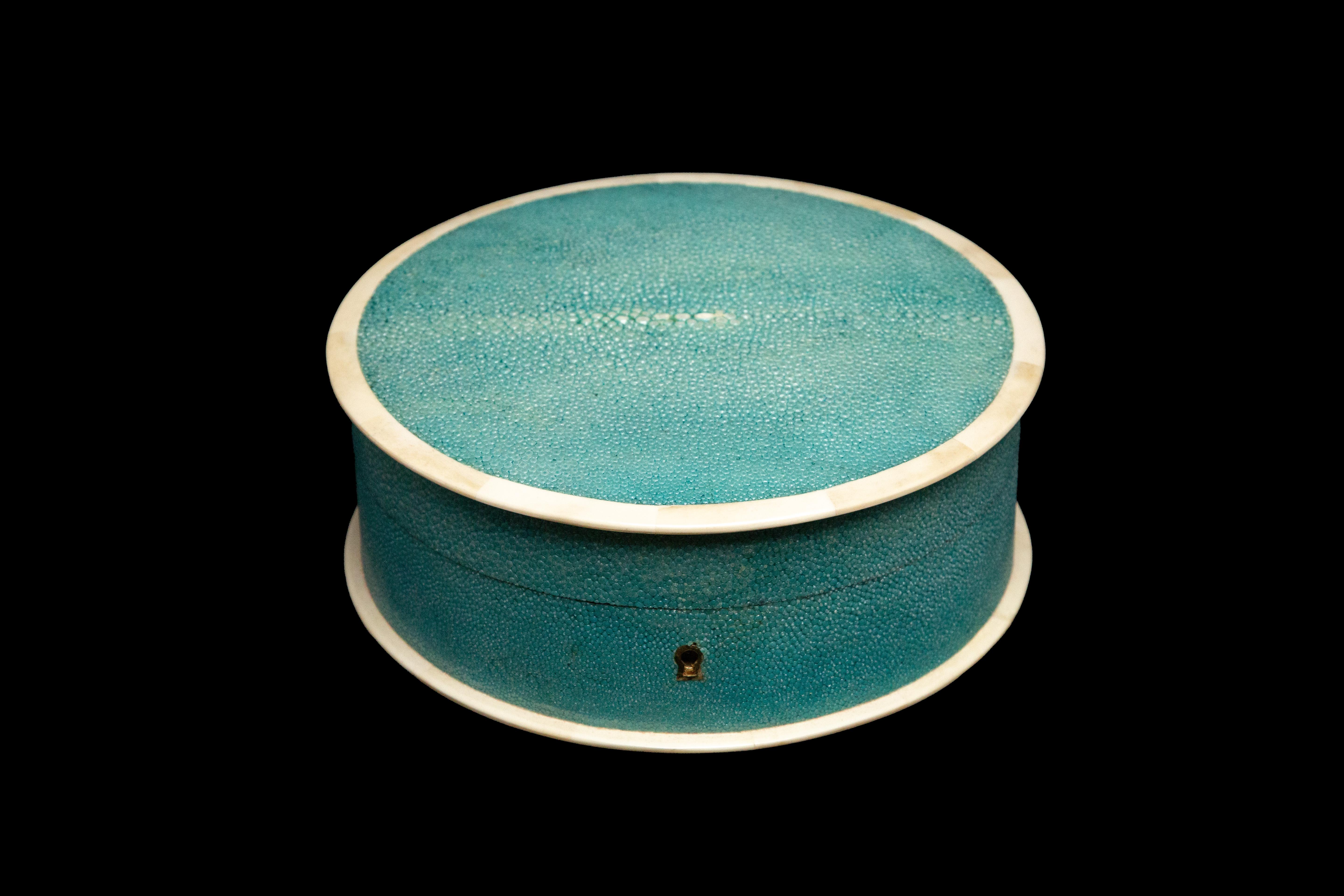 Round Pale Blue Shagreen jewelry box

Measures approximately: 9.5