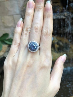 Round Pastel Blue Sapphire with Diamond Ring Set in 18 Karat White Gold Settings