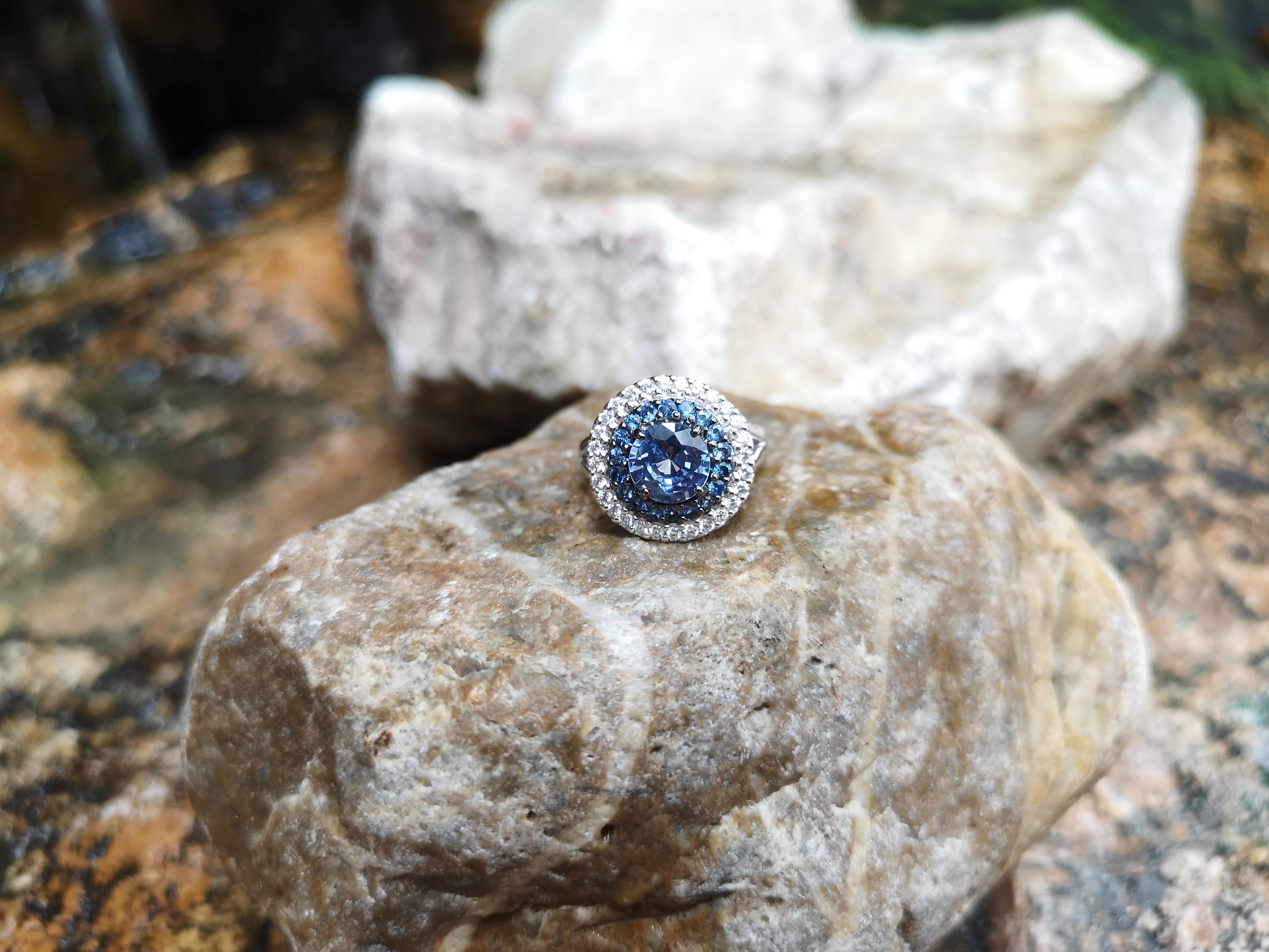 Contemporary Round Pastel Blue Sapphire with Diamond Ring Set in 18 Karat White Gold Settings For Sale