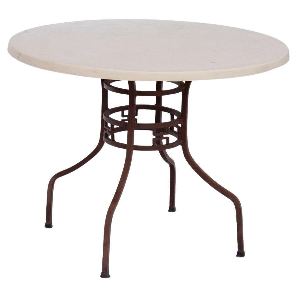 Mesa de terraza redonda con tablero de fibra de vidrio después de Brown Jordan
