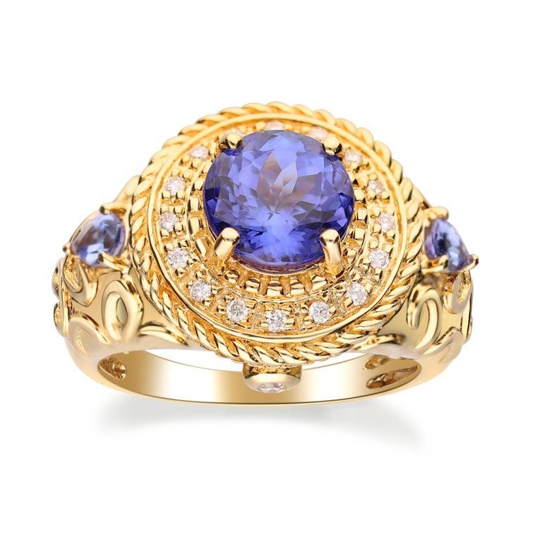 Round, Pear-cut Tanzanite With Diamond accents 14K Yellow Gold Ring. For Sale