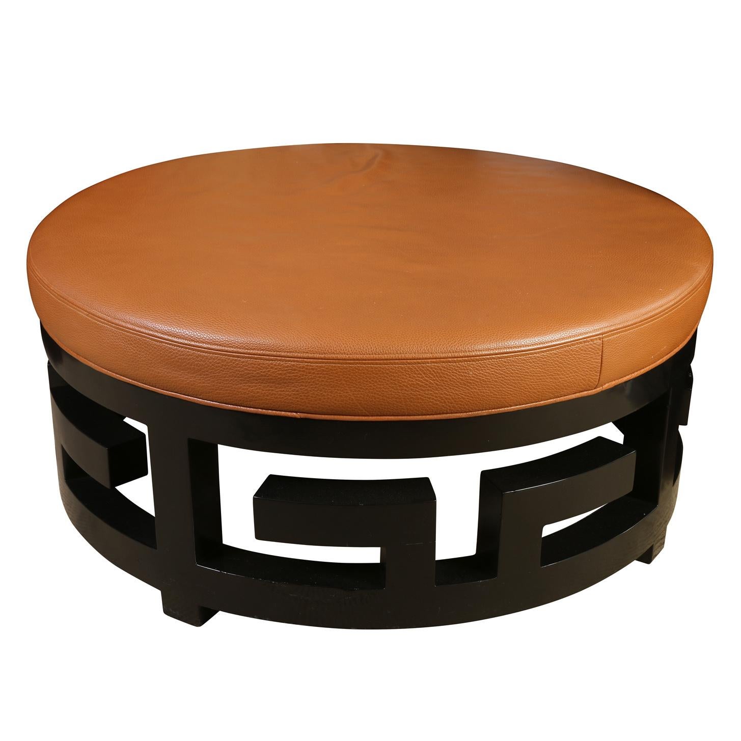 Round Pebbled Leather Ottoman with Black Fretwork Base In Good Condition For Sale In Locust Valley, NY