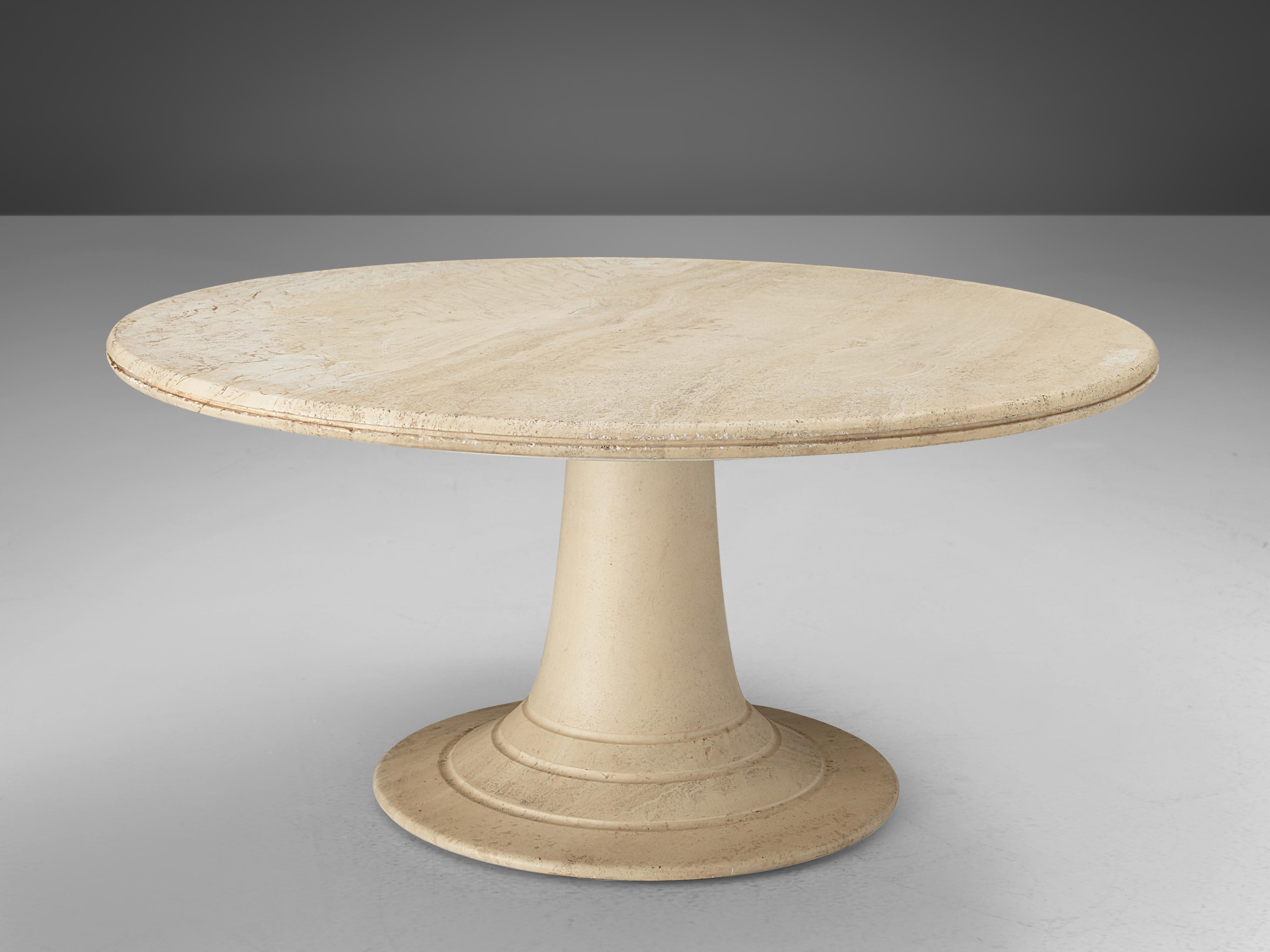 Coffee table, travertine, Europe, 1970s

Beautiful coffee table completely executed in travertine. The base consists of a round pedestal that gets wider towards the base to which it seems to float over. The base itself is highlighted with three
