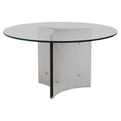 Round pedestal dining table in steel and glass from the 1970s