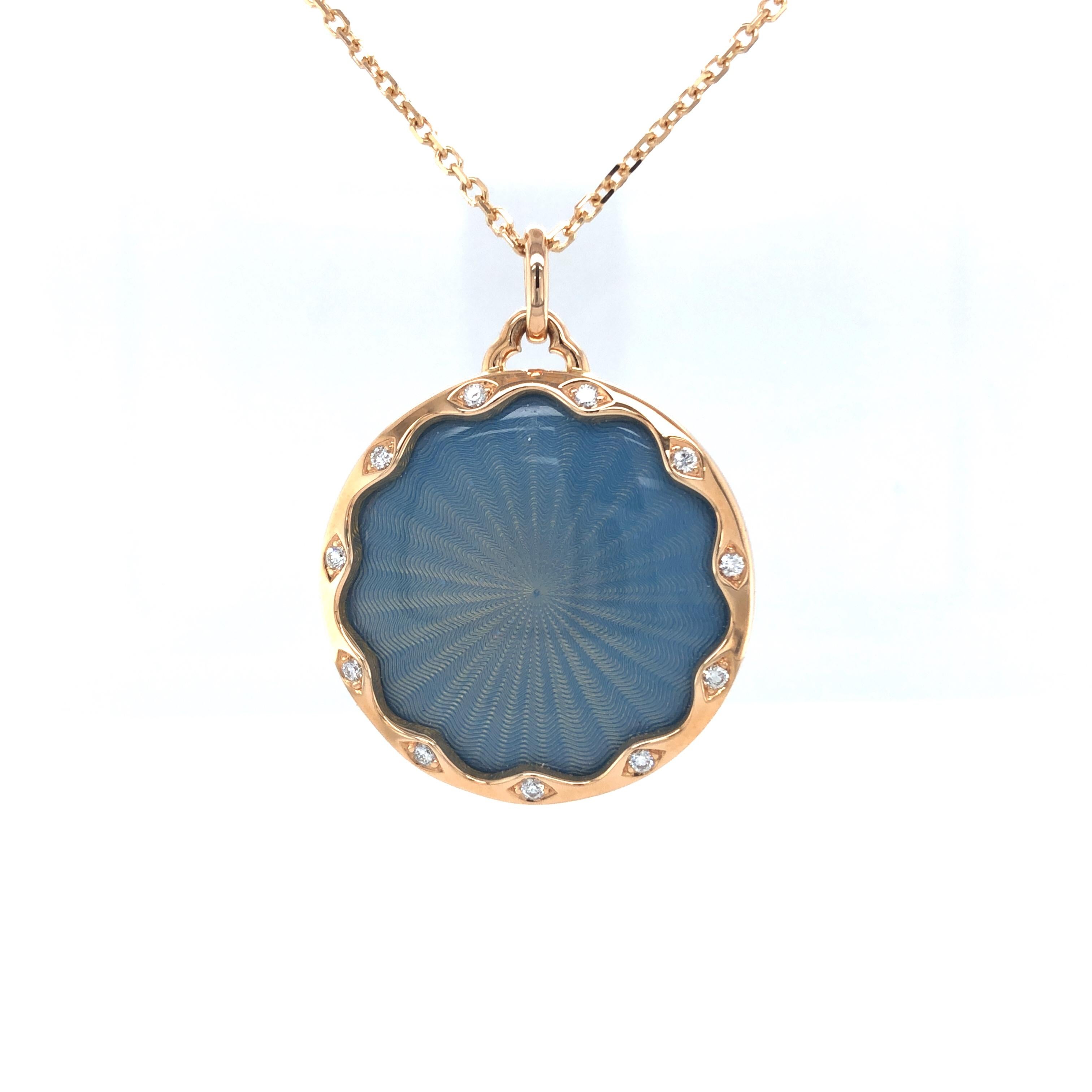 Victor Mayer pendant 18k rose gold, Macaron collection, blue vitreous enamel, manual guilloché engraving, 11 diamonds, total 0.16 ct, G VS brilliant cut, diameter 27.2 mm, limited edition

About the creator Victor Mayer
Victor Mayer is