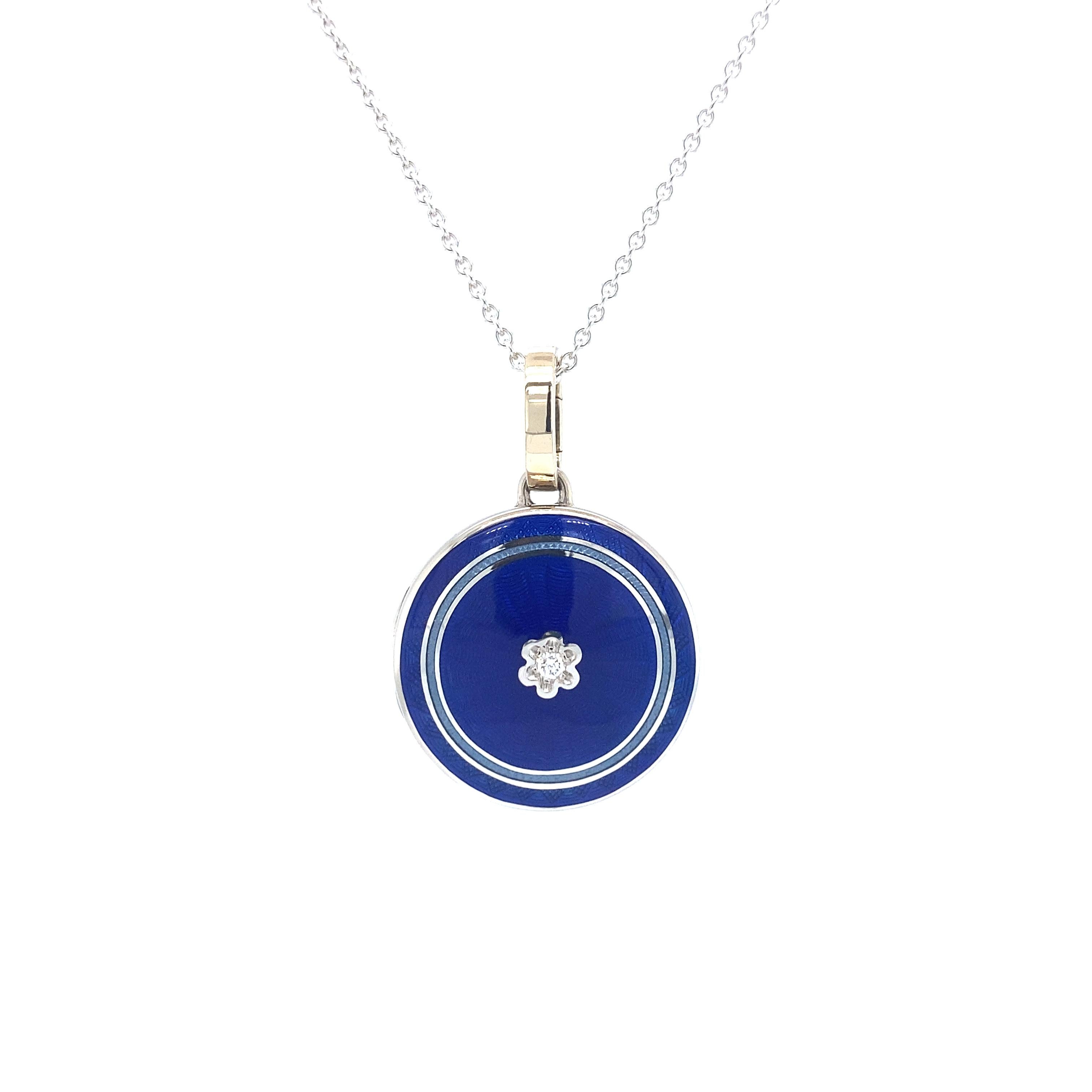 Victor Mayer round locket pendant necklace in 18k white gold with royal blue vitreous enamel and 1 brilliant cut diamond total 0.03 ct, H VS

About the creator Victor Mayer 
Victor Mayer is internationally renowned for elegant timeless designs and