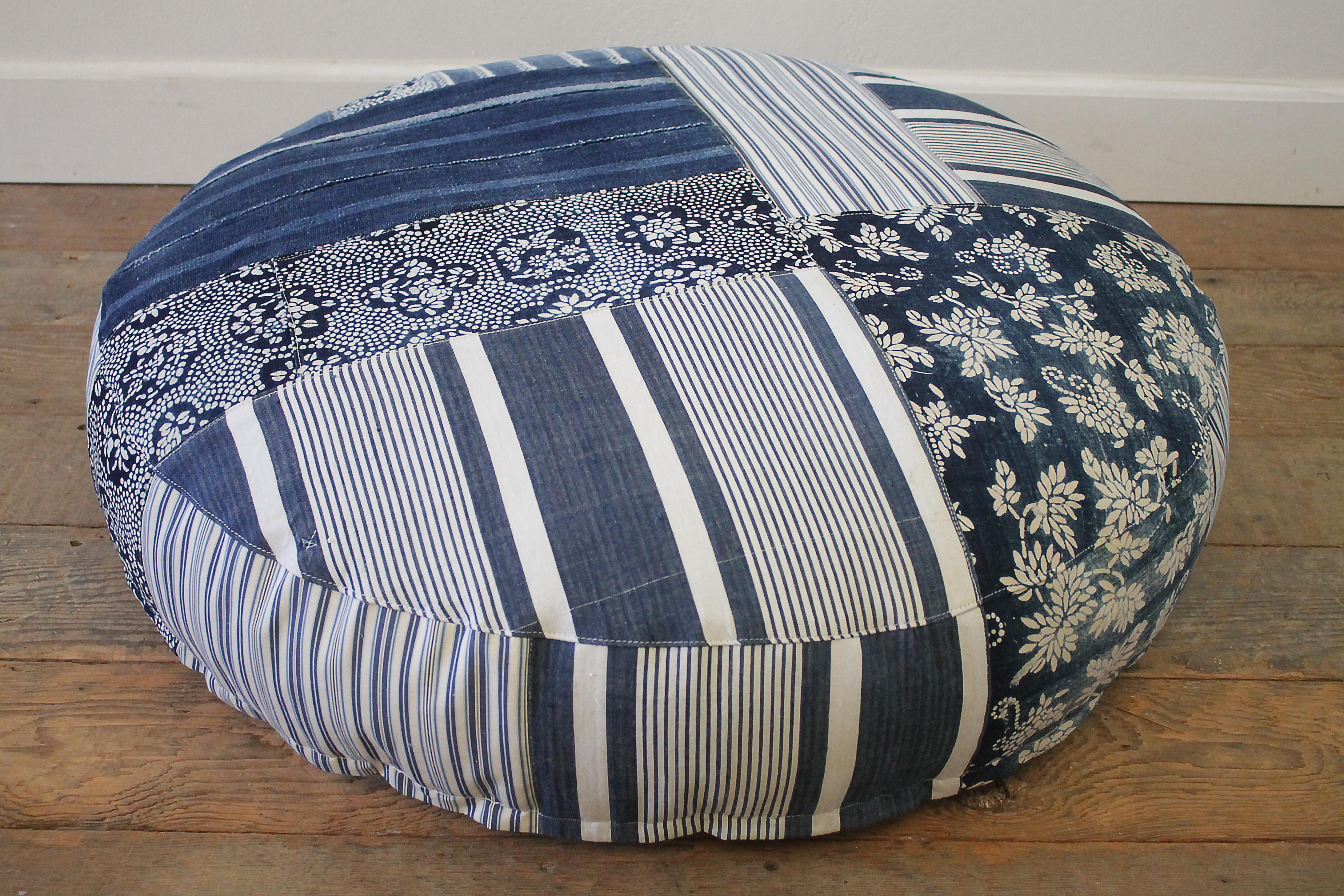 Round pet bed made from vintage batik mud cloth indigo textiles.
Custom-made in our Full Bloom Cottage studio, from vintage and antique textiles. A French mattress ticking stripe, antique Japanese batik, and African mud cloths make up this ultra