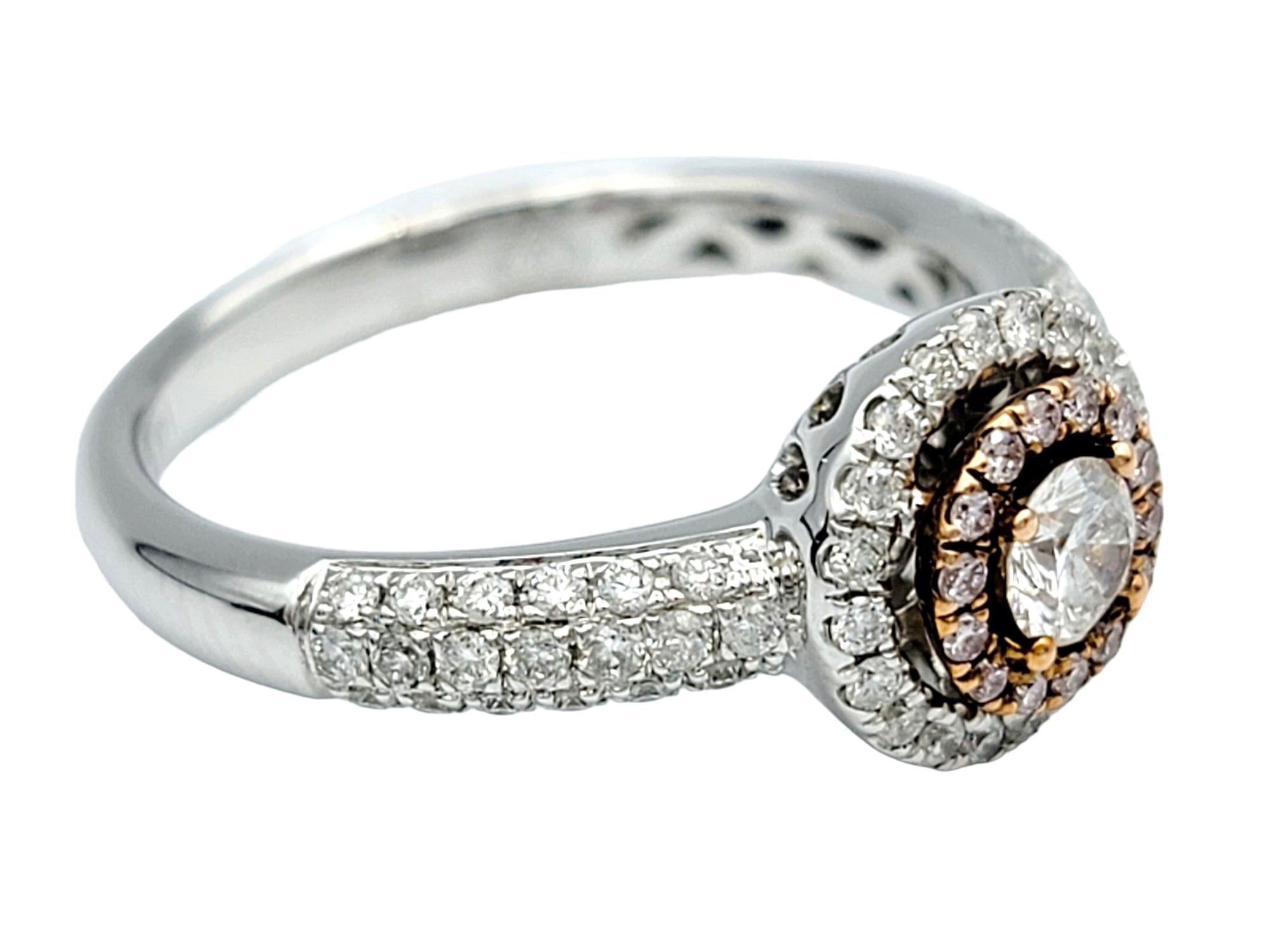Round Cut Round Pink and White Diamond Double Halo Band Ring in 18 Karat White & Rose Gold For Sale
