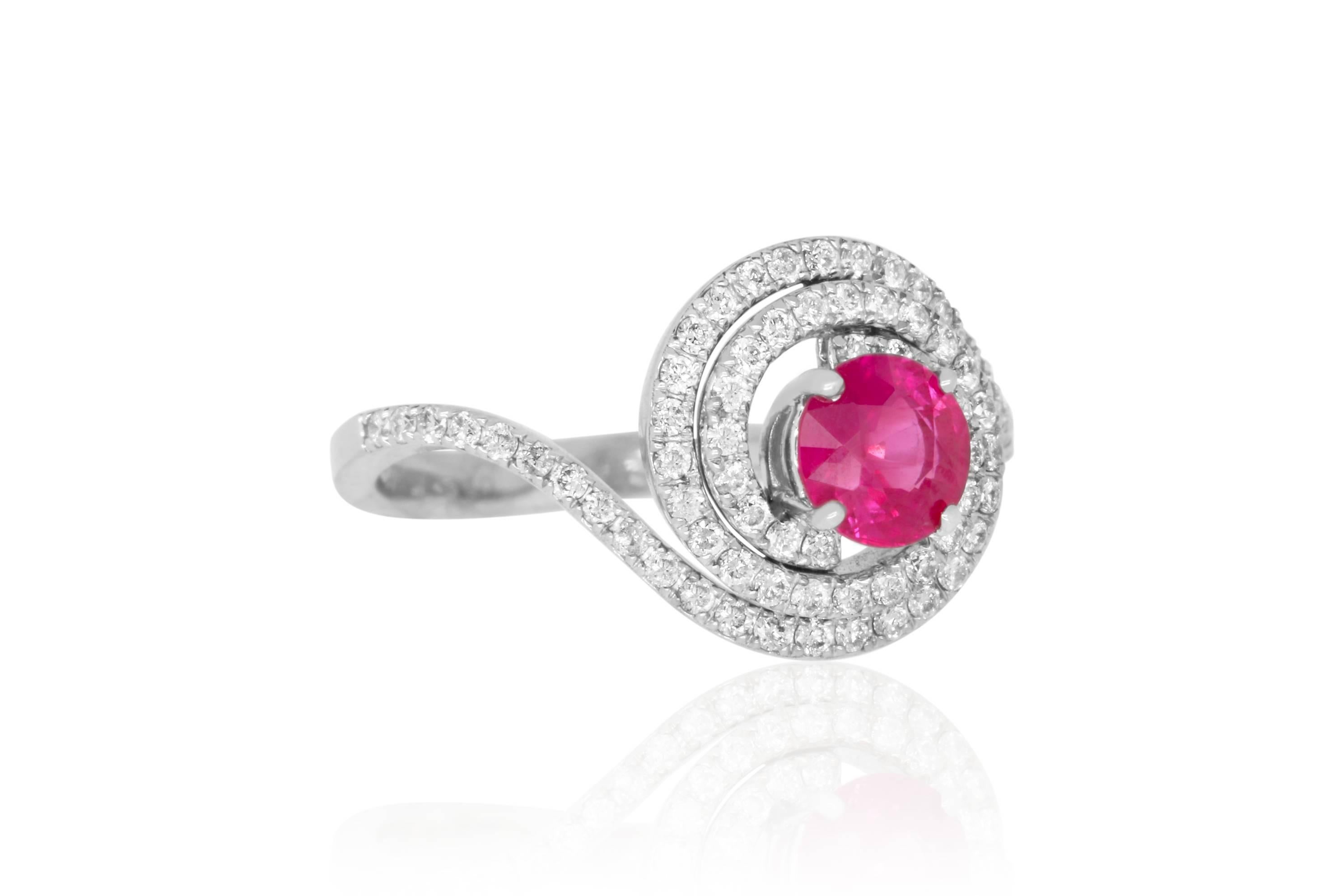 Material: 14k White Gold 
Color Stone Details:  0.98 Carat Round Cut Ruby 
Center Stone Details: 72 Round Cut White Diamonds at 0.43 Carats- Clarity: SI  / Color: H-I
Ring Size: 7. Alberto offers complimentary sizing on all rings.

Fine one-of-a