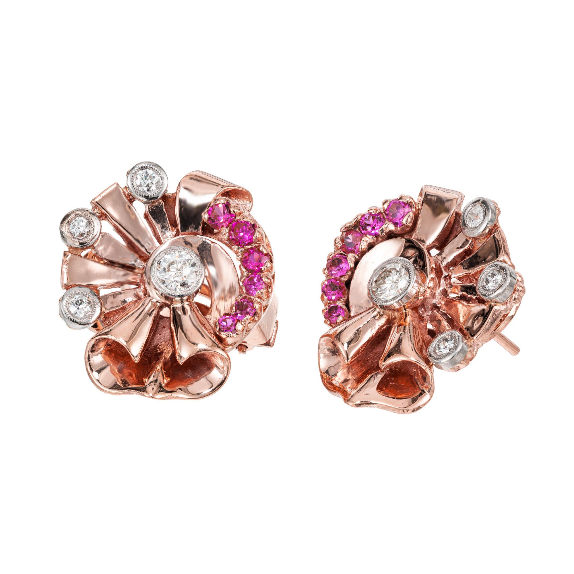 Late Art Deco sapphire and diamond earrings. Hailing from the late 1930's, these 14k rose gold clip post ribbon style earrings each boast 6 pink round sapphires along with 4 bezel set full cut diamonds that are encased in 14k white gold. Secure