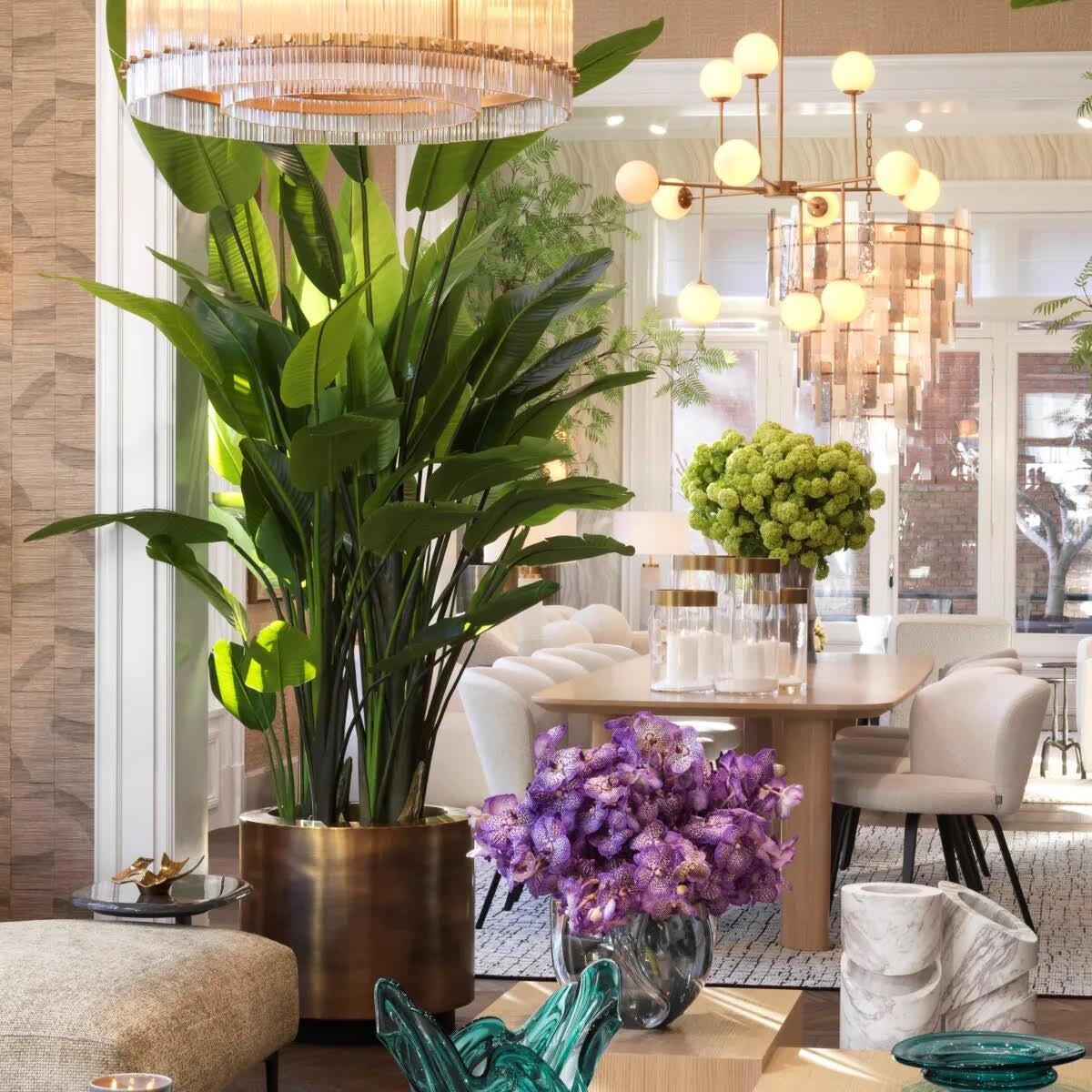 Round planter, patinated brass finish, black base, functional elegance.

This beautiful planter features a patinated brass finish, giving it a sophisticated decorative touch, ideal for any luxurious interior.

Ø 60  H. 54.5 cm
Internal dimensions: Ø