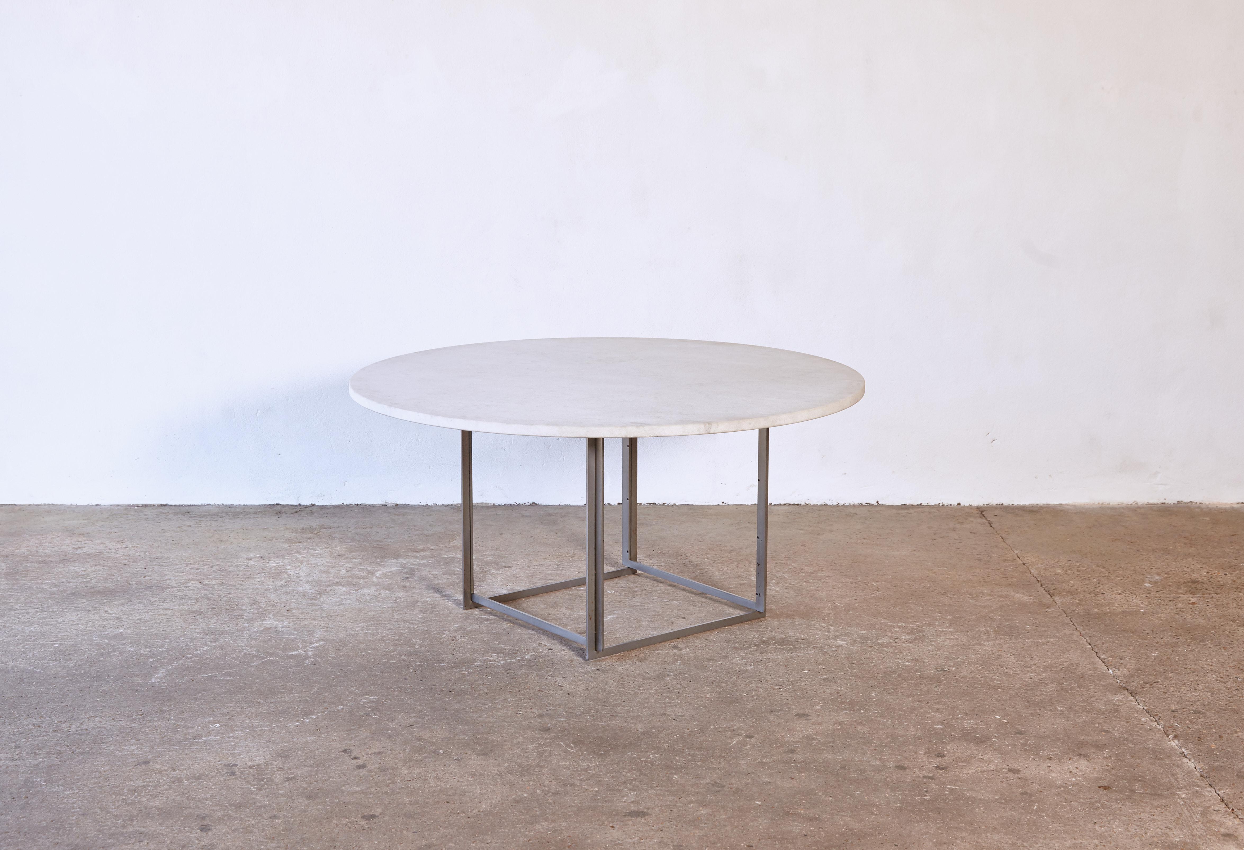Round Poul Kjaerholm PK-54 dining table by E. Kold Christensen, Denmark, 1960s. Flint rolled Cippolino marble top and a matte chrome-plated steel base. Stampled with EKC makers mark. A removable wooden riser has been added under the table top to add