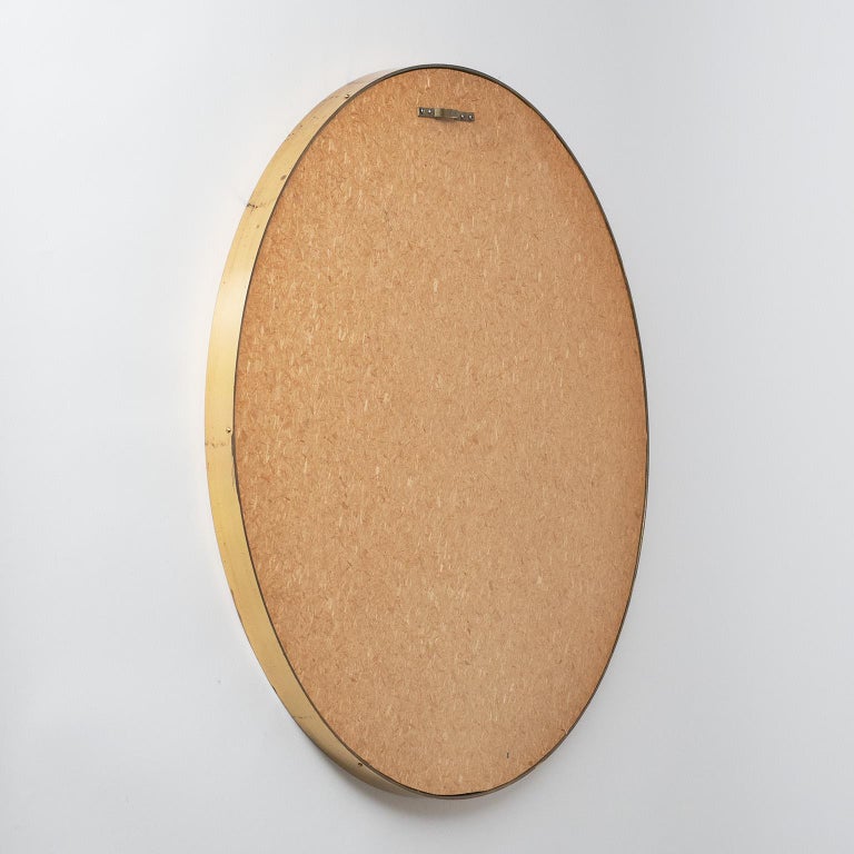 Mid-20th Century Round Profiled Brass Mirror, 1950s For Sale