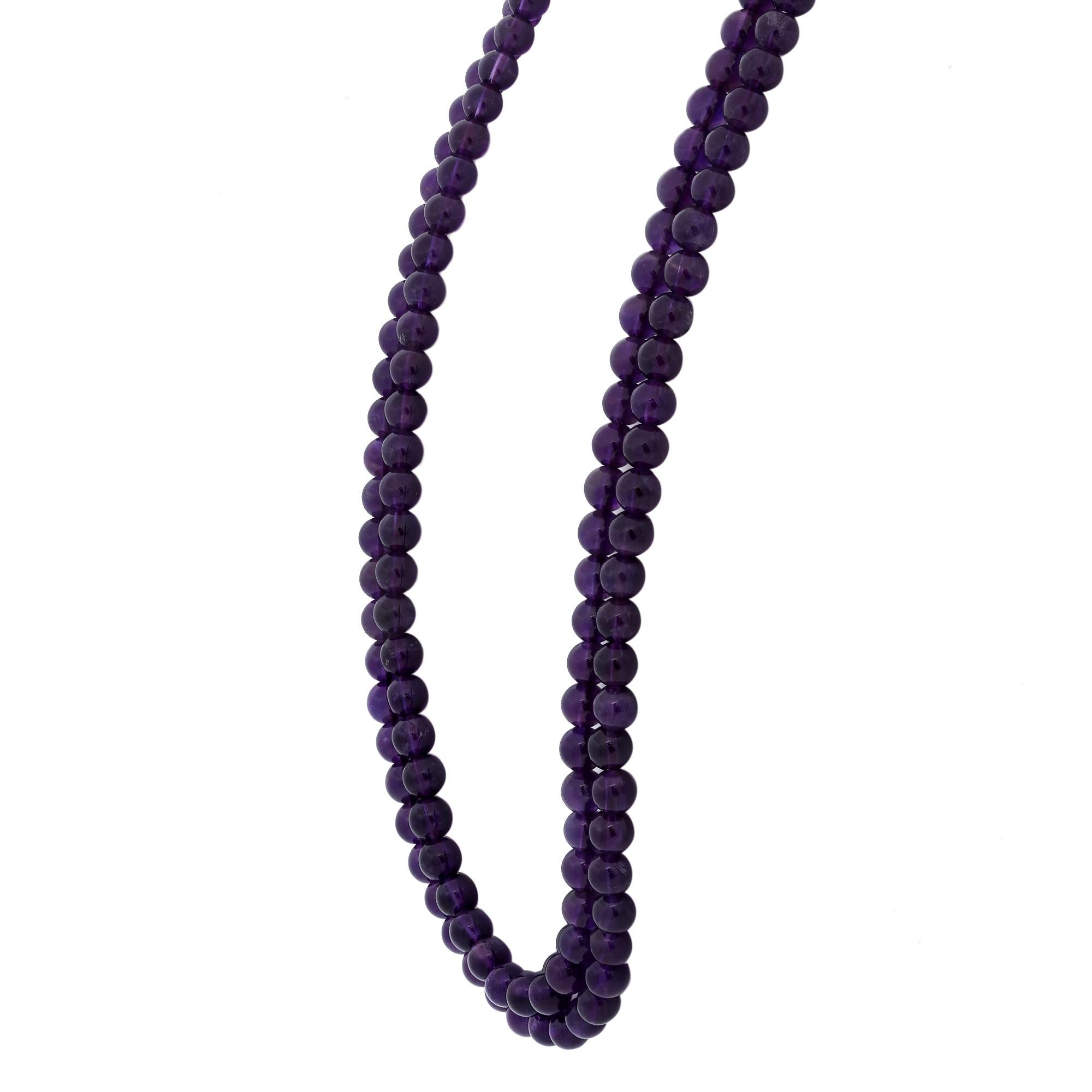 Adorn this gorgeous double strand necklace for an amazing statement look. This necklace features round Amethyst beads, well matched. Handcrafted with perfection. Necklace length: 18 Inches. Total weight 45.95 grams. Great pre-owned condition. Comes