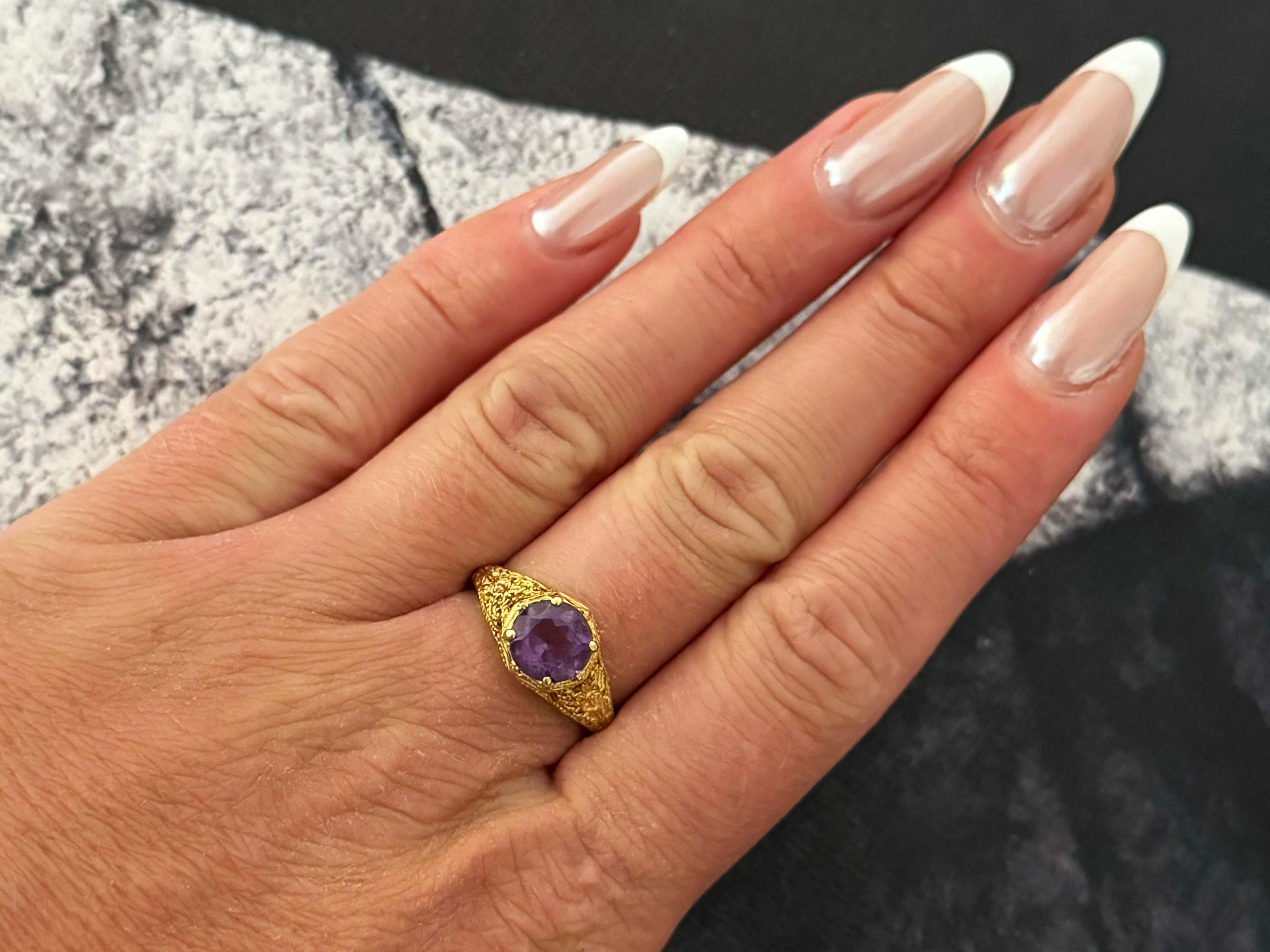 Ring Specifications:

Metal: 14k Yellow Gold

Total Weight: 3.4 Grams

Gemstone: 1 Round cut amethyst 

Ring Size: 7.5 (resizable)

Stamped: 