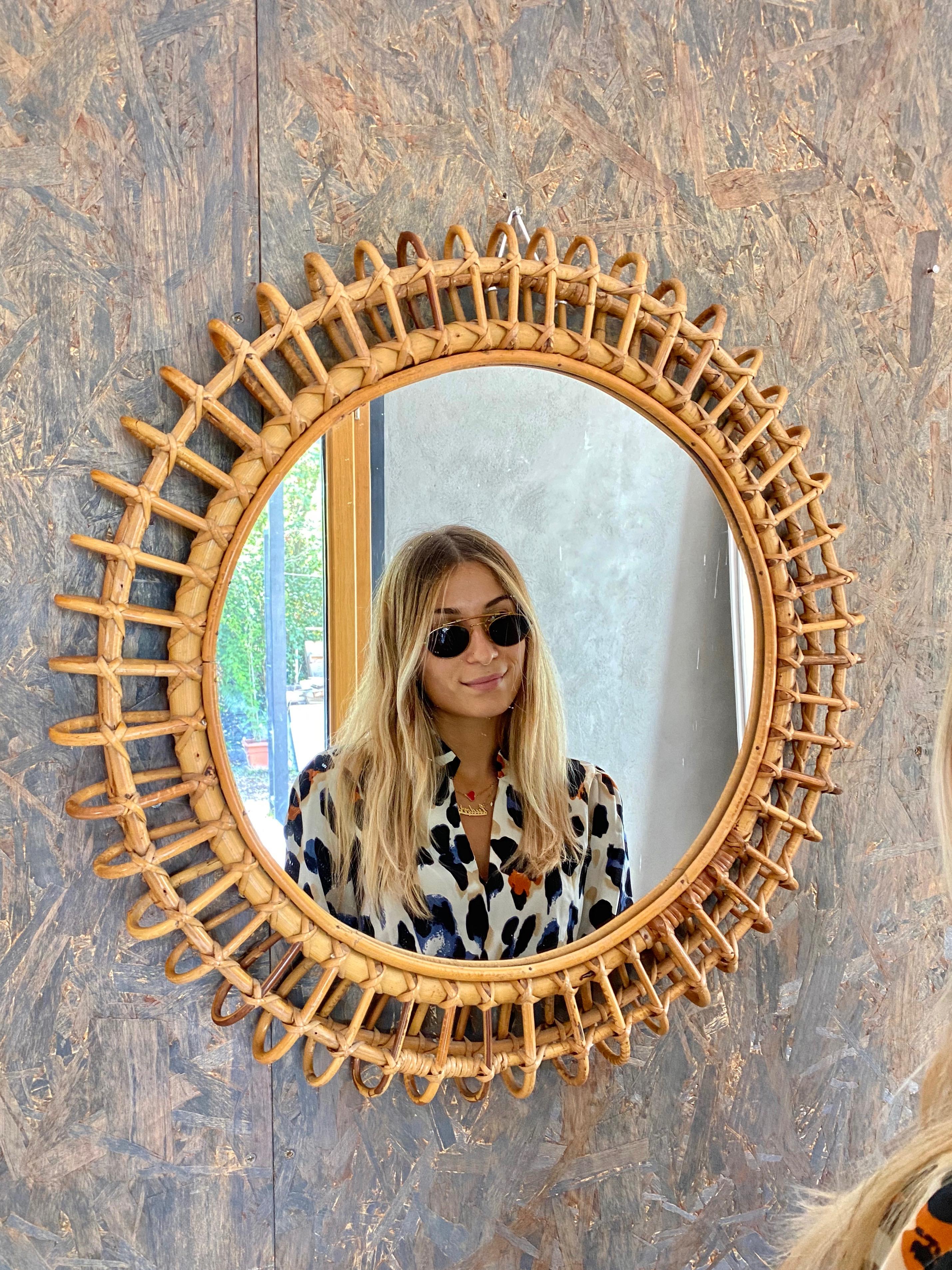 Round rattan Italian wall mirror, 1960s.