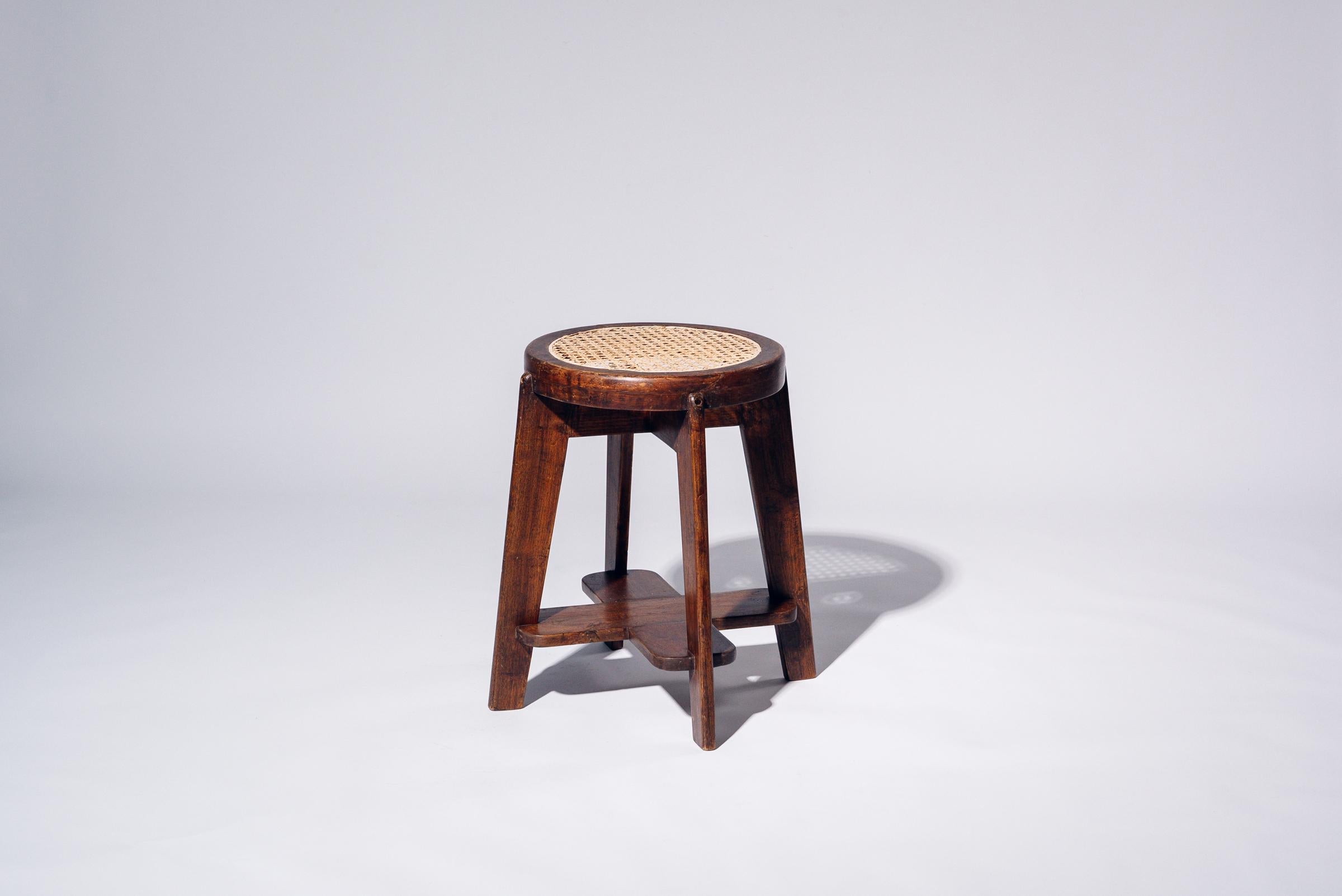 An authentic mid-century piece from Pierre Jeanneret’s legendary Chandigarh commission. Teak frame with hand-woven bamboo-rattan seat.