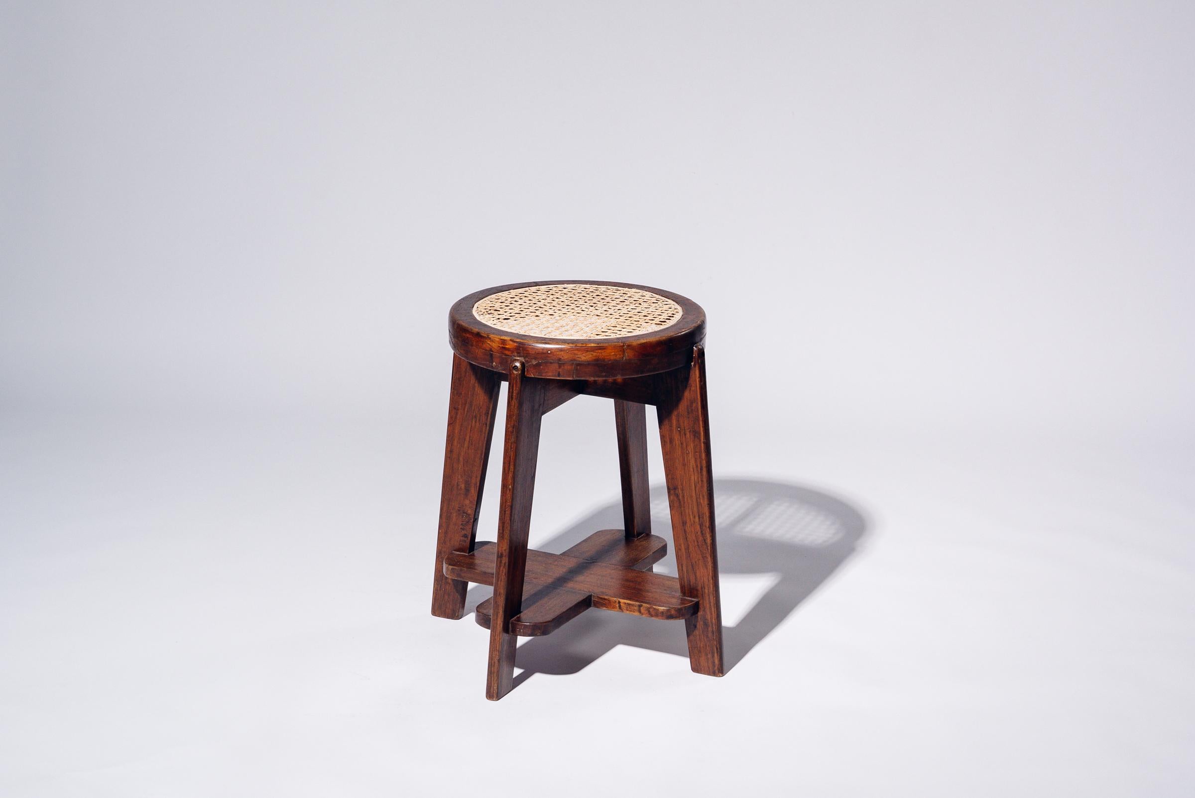 An authentic mid-century piece from Pierre Jeanneret’s legendary Chandigarh commission. Teak frame with hand-woven bamboo-rattan seat.