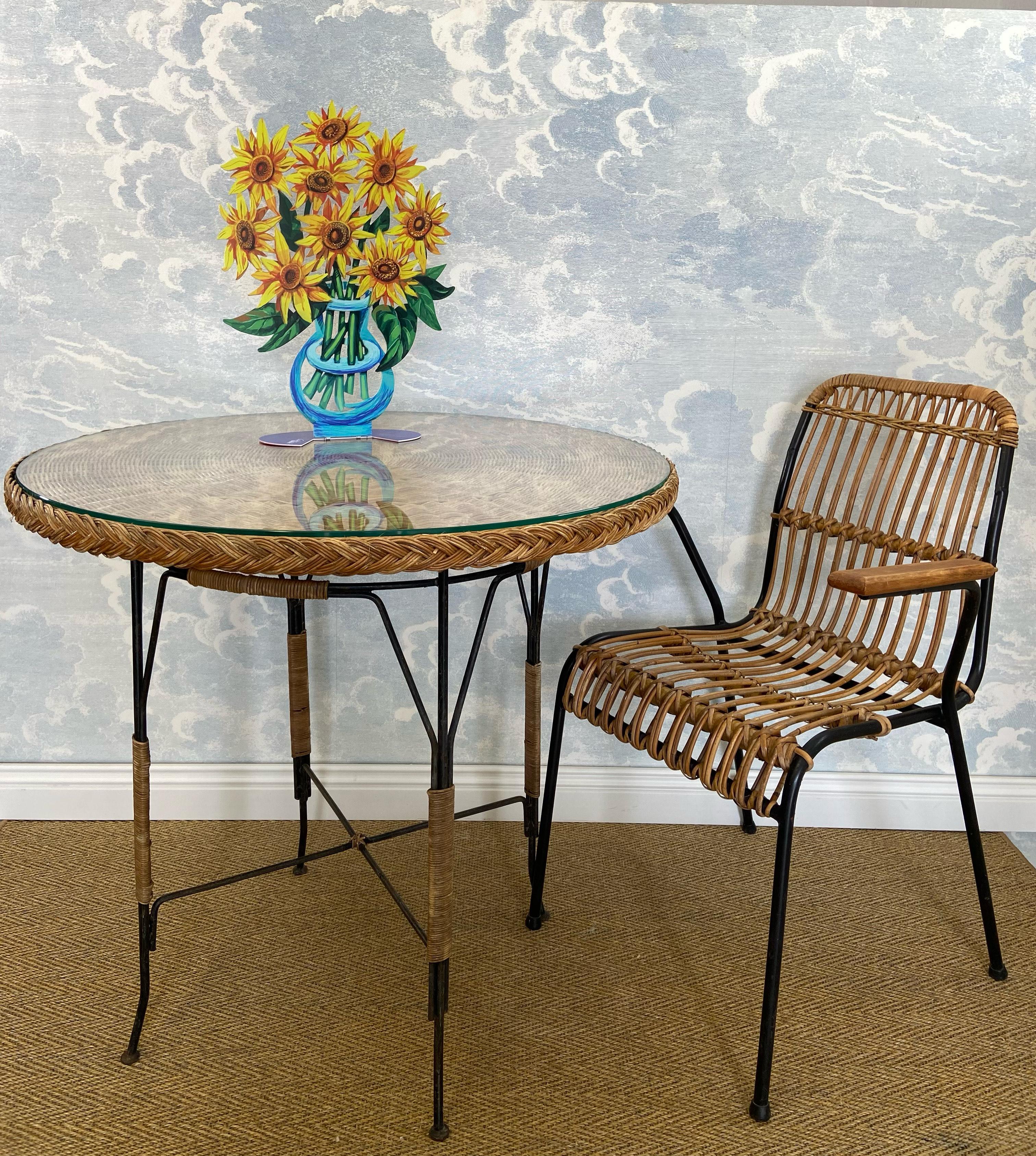 Bohemian Round Rattan Wicker Table On Black Metal Frame with Glass Top, Germany, ca. 1920 For Sale
