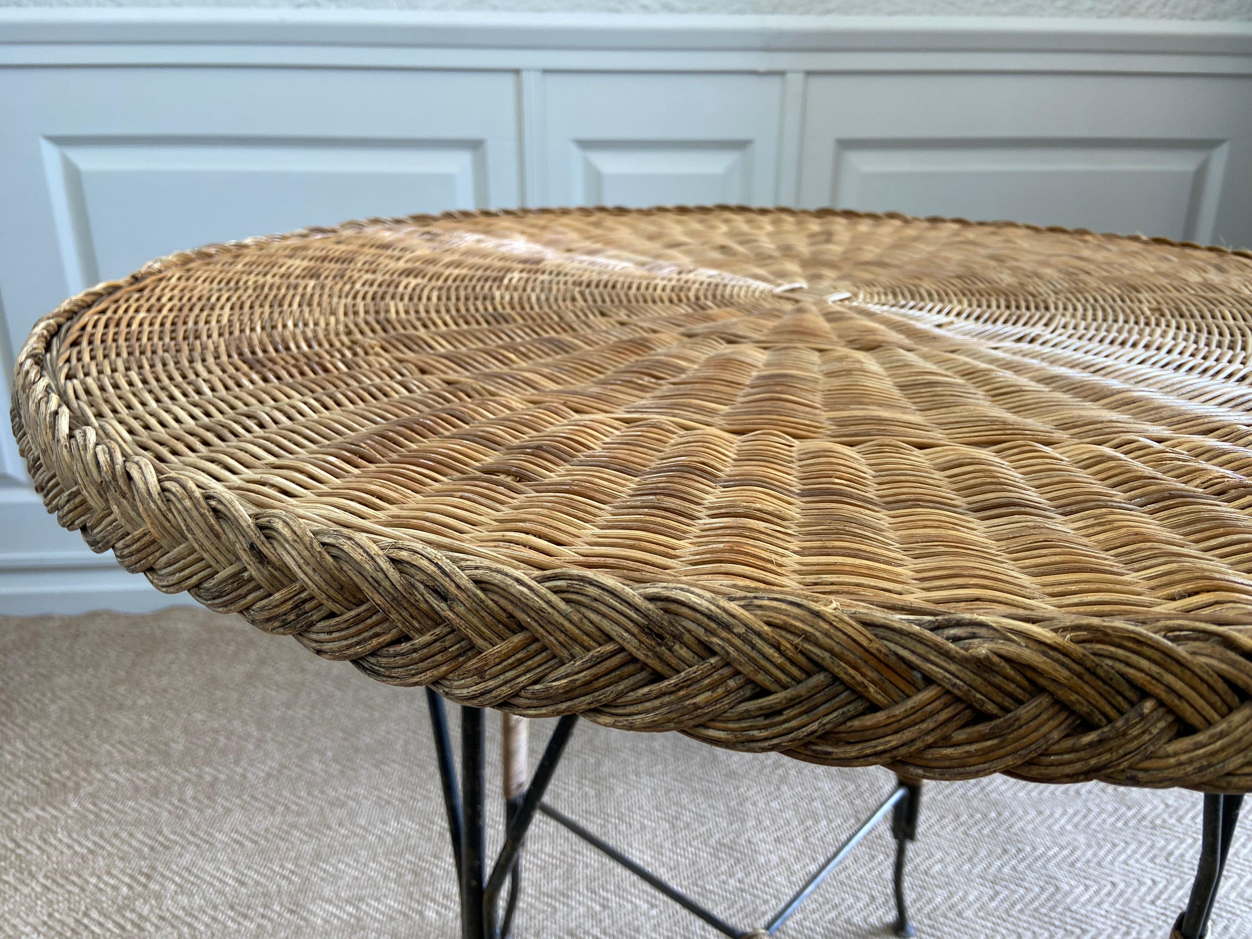 Round Rattan Wicker Table On Black Metal Frame with Glass Top, Germany, ca. 1920 In Fair Condition For Sale In Cork, IE