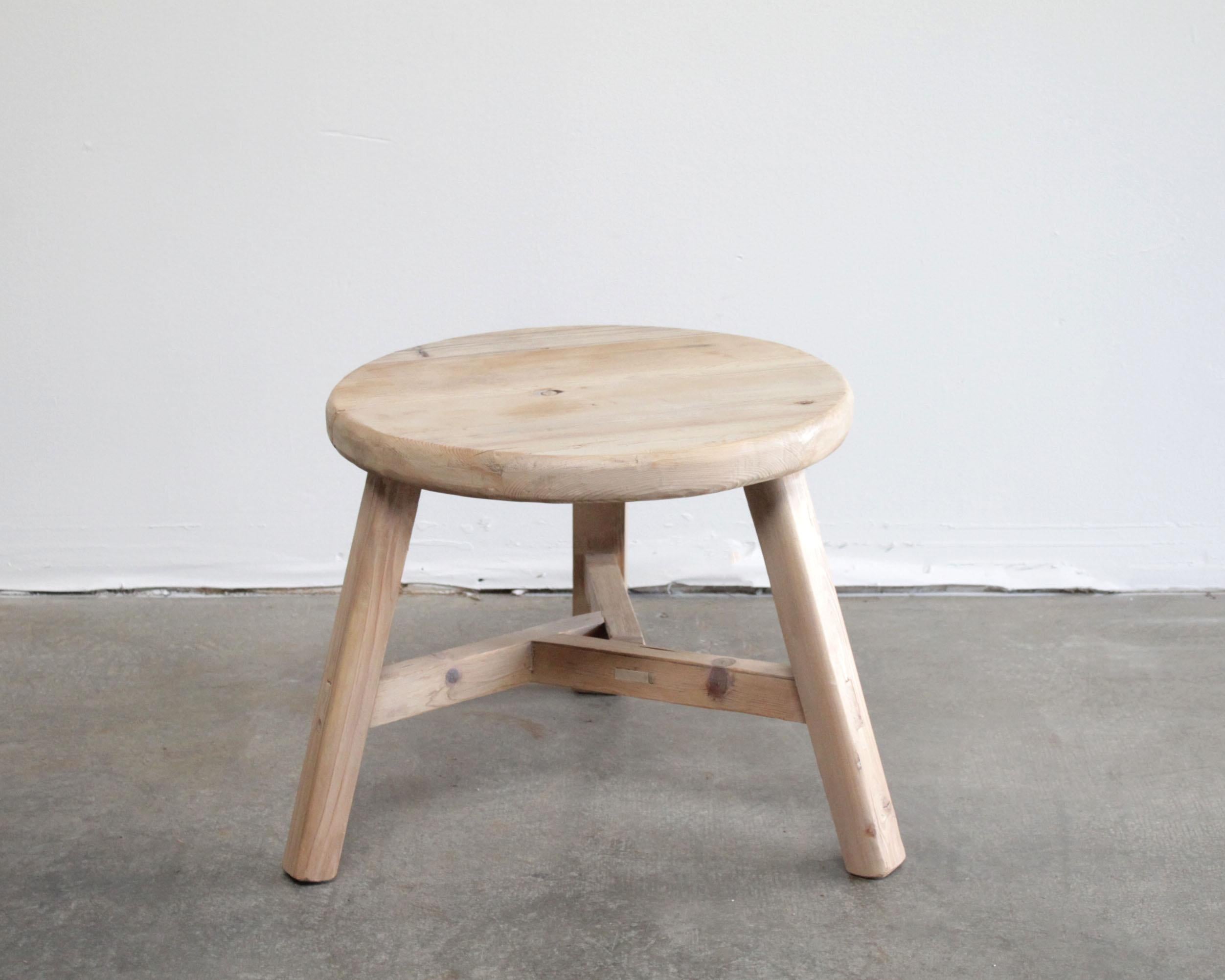 Round natural side table made from reclaimed elmwood raw natural finish, a warm honey with gray tones in the wood. Solid and sturdy, a great side table for next to a bed, sofa, chairs. Can be stained or painted for a customized look
Size: 24