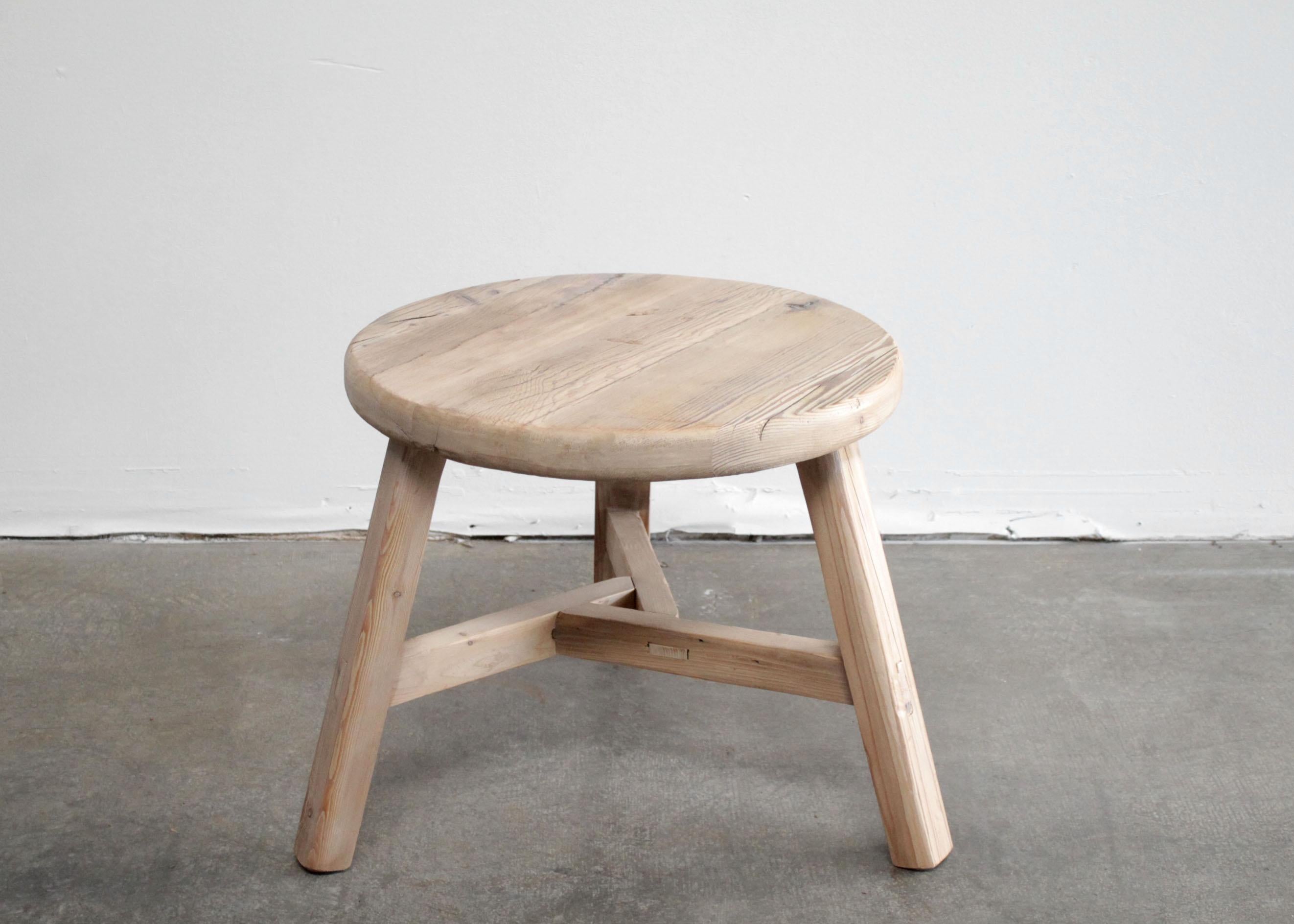 Round natural side table made from reclaimed elmwood raw natural finish, a warm honey with gray tones in the wood. Can be stained or painted for a customized look. Solid and sturdy, a great side table for next to a bed, sofa, chairs.
Size: 24