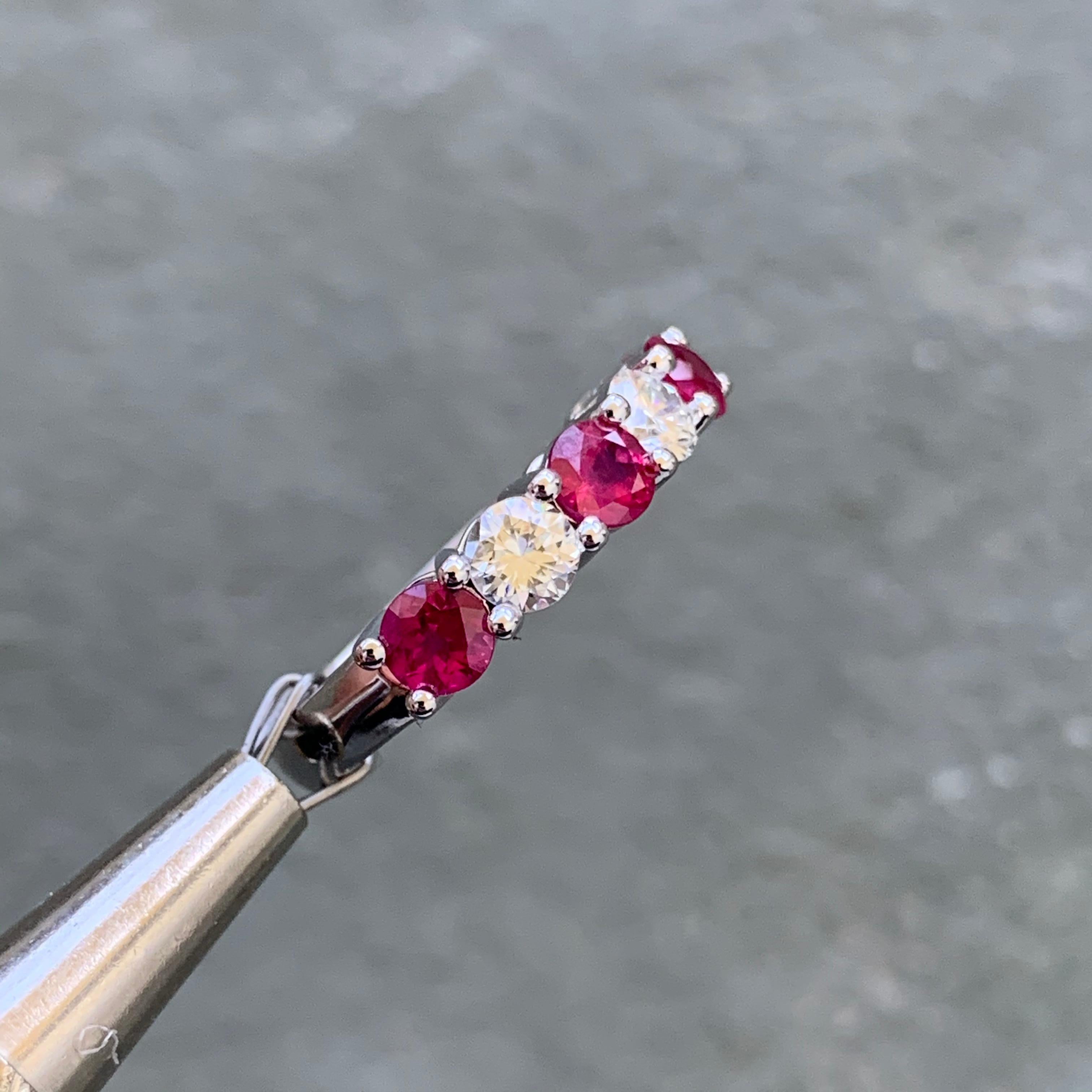 Made to order, please allow 1-2 weeks from date of final design approval by customer. 
Can be made in other sizes and also in other metals or stone colors.

Round Red Ruby and Diamond Half Eternity Band 14 Karat White Gold


Width: 4.1 - 4.2 mm (The
