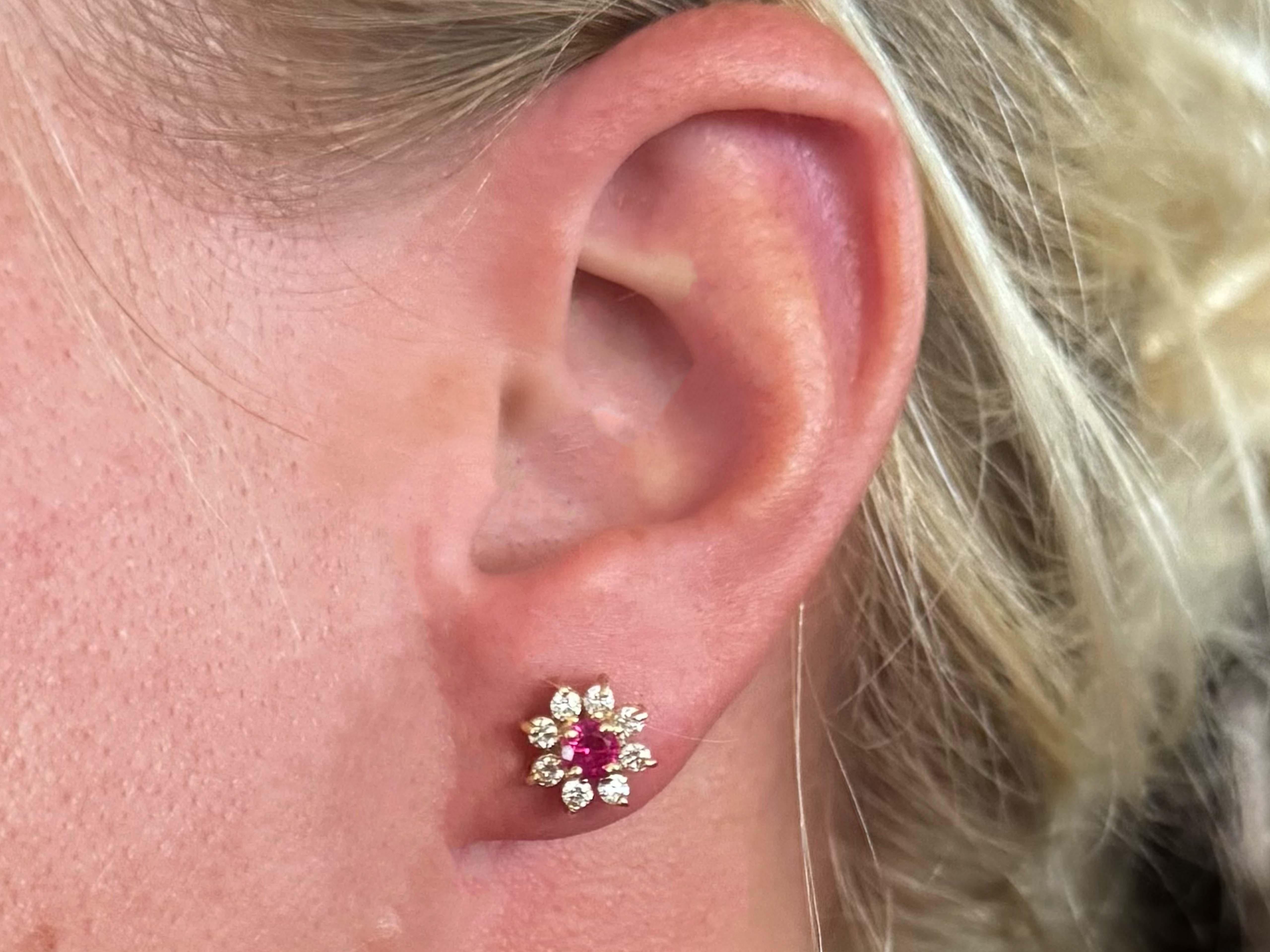 
​Earrings Specifications:

Metal: 14k Yellow Gold

Total Weight: 2.8 Grams

Earring Diameter: ~10 mm x 10 mm
​
​Diamond Count: 16 brilliant cut 
​
​Diamond Color: G
​
​Diamond Clarity: VS
​
​Diamond Carat Weight: ~0.50 carats

Ruby Setting: