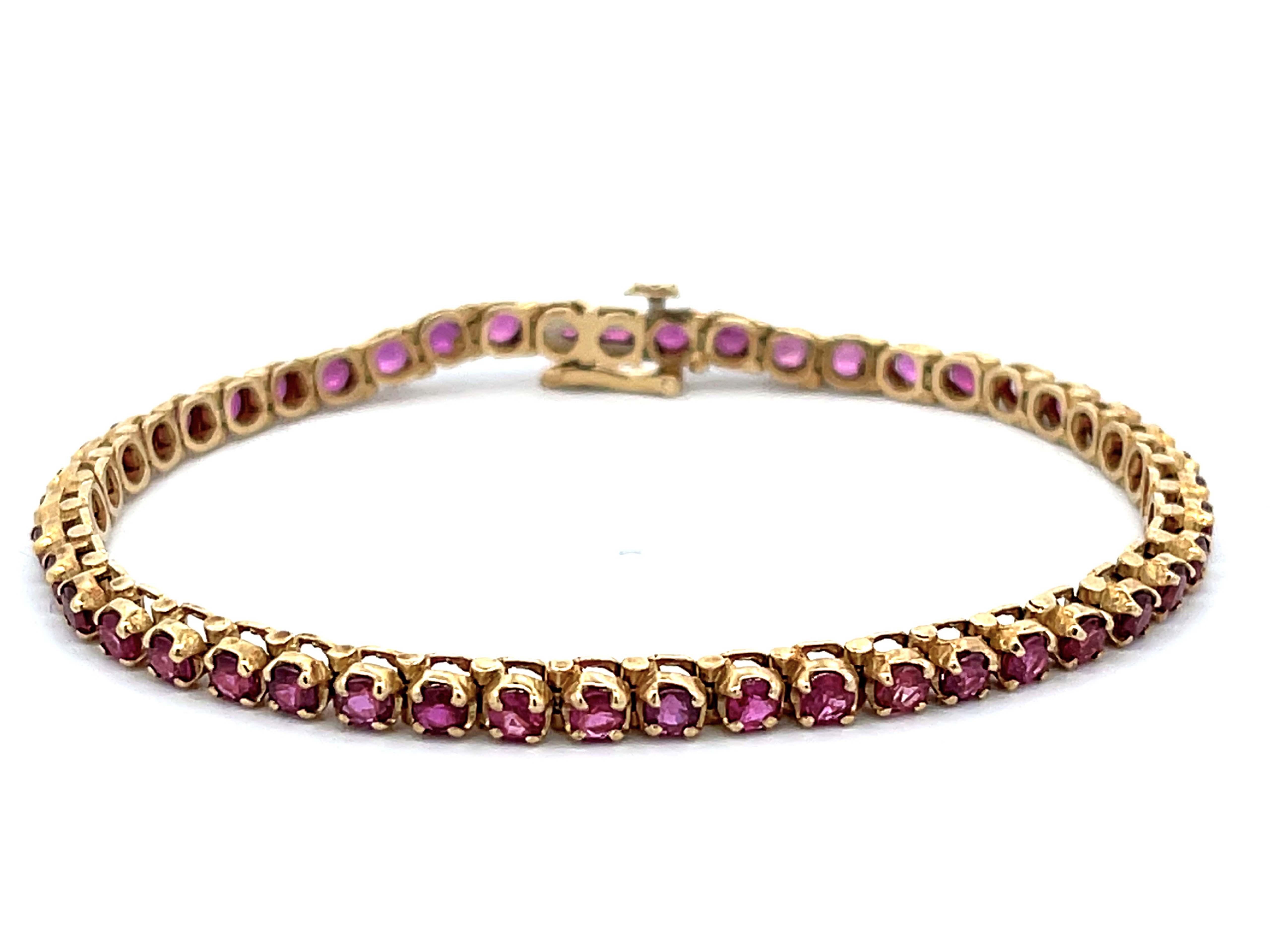 Round Red Ruby Tennis Bracelet in 14k Yellow Gold For Sale 1