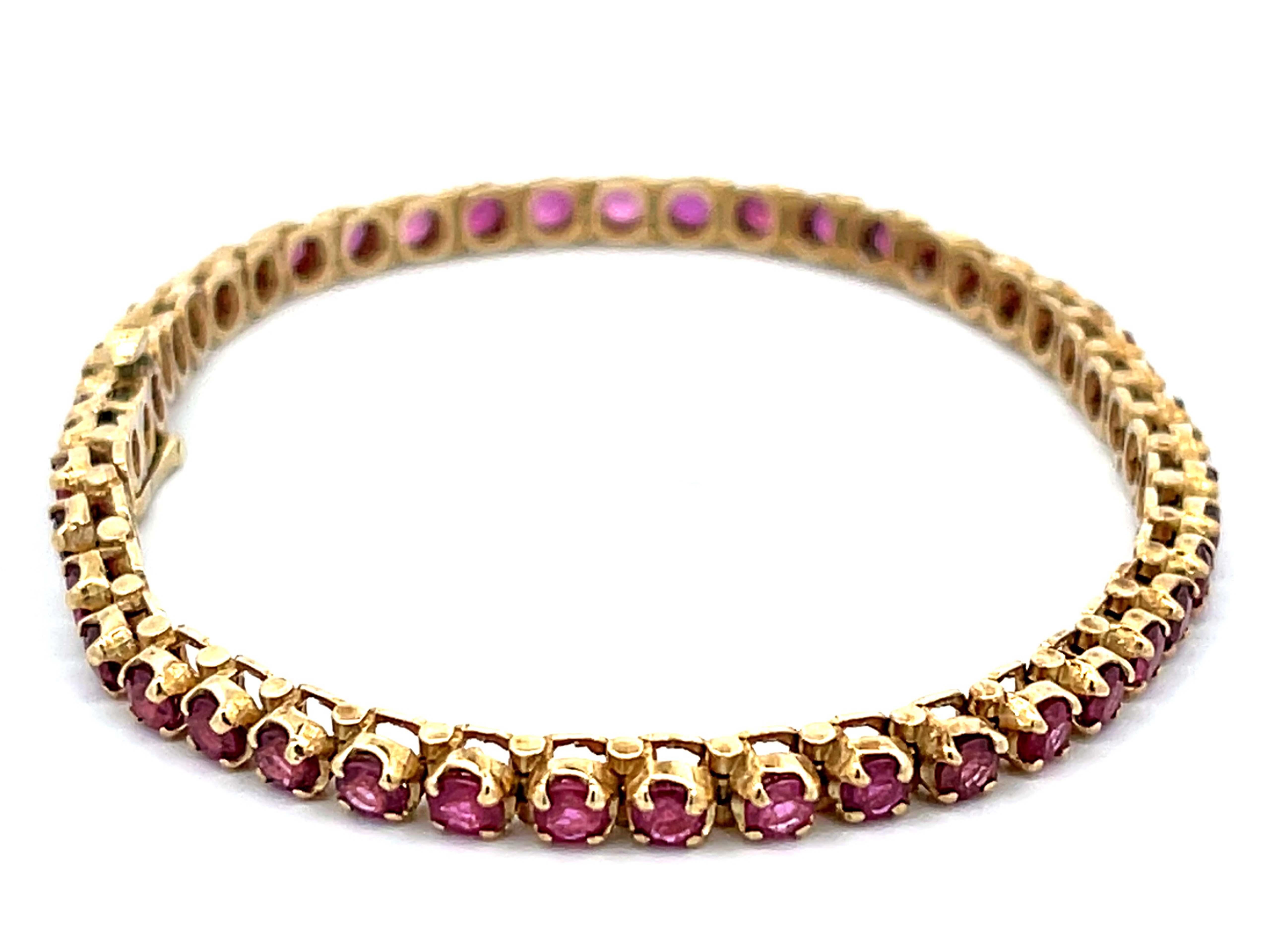 Round Red Ruby Tennis Bracelet in 14k Yellow Gold For Sale 2