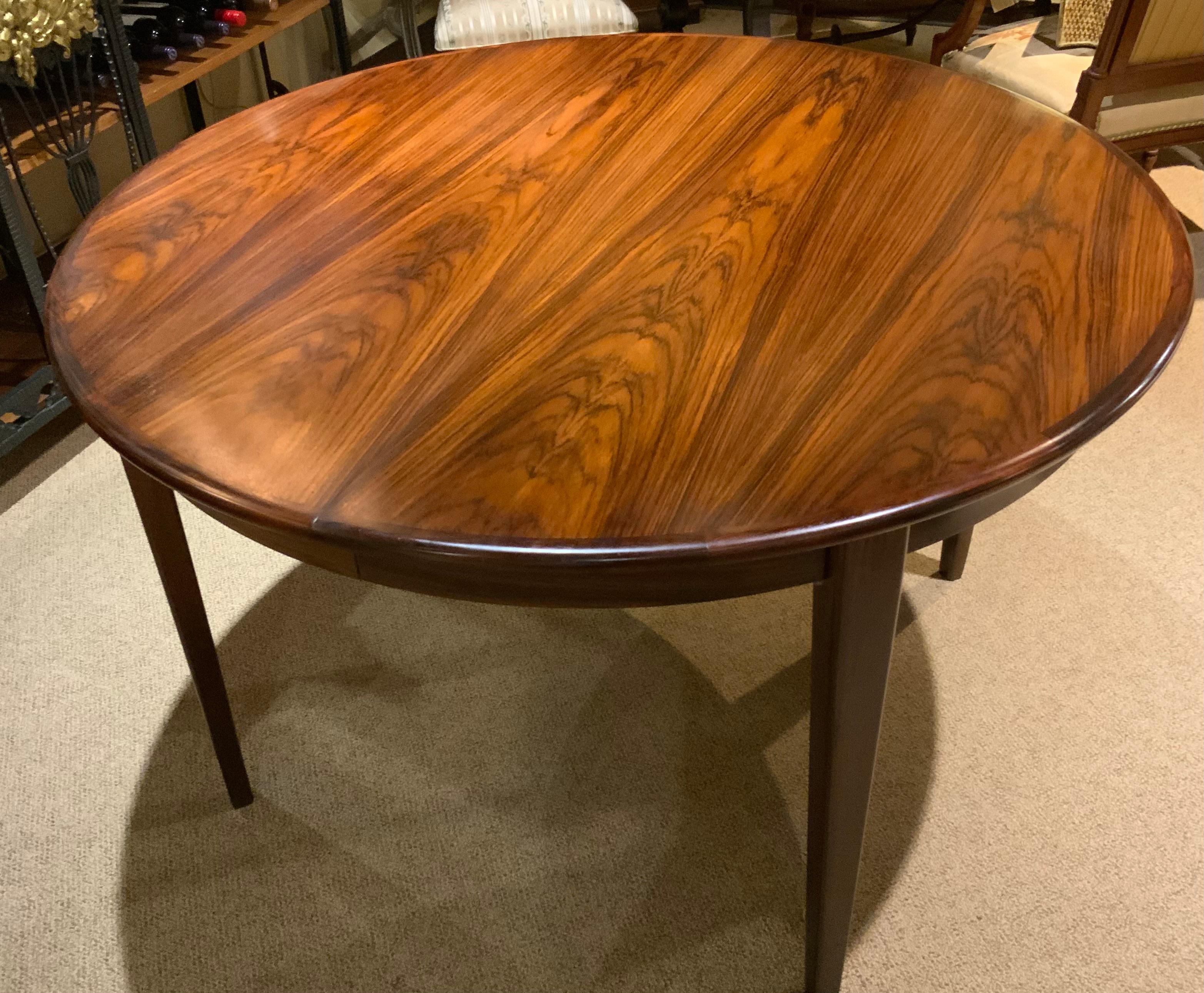 Danish Round  rosewood dining table by sigh and sons, mid 20 th c.  For Sale